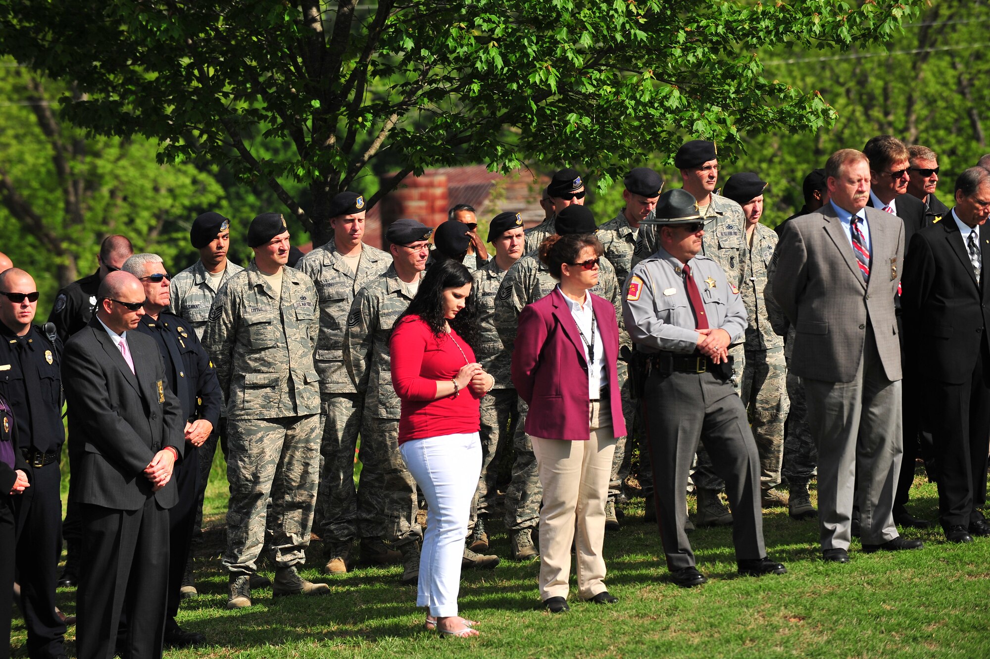 U.S. Air Force Airmen assigned to the 4th Fighter Wing and members of the local community gather for the Law Enforcement Memorial Service at Wayne Community College in Goldsboro, N.C., May 8, 2013. During National Police Week, several organizations dedicated to honoring America's law enforcement community come together to recognize law enforcement officers who sacrificed their lives in the line of duty. (U.S. Air Force photo by Airman 1st Class Aubrey White/Released)
