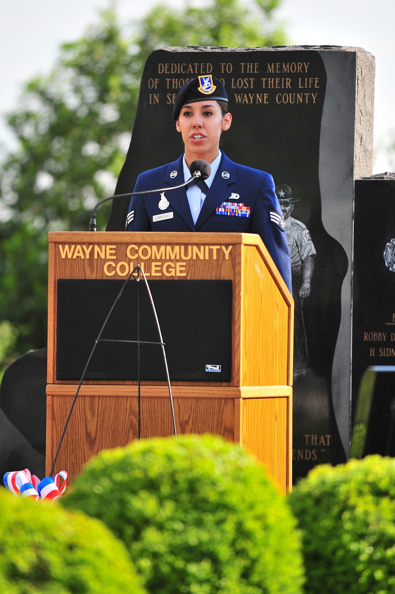 U.S. Air Force Senior Airman Marcia Montoya, 4th Security Forces Squadron defender, recites the “Pledge of Allegiance” during the Law Enforcement Memorial Service at Wayne Community College in Goldsboro, N.C., May 8, 2013. Several members of the 4th SFS participated in the ceremony along with their civilian officer counterparts to honor those who protect and defend our Nation. (U.S. Air Force photo by Airman 1st Class Aubrey White/Released)