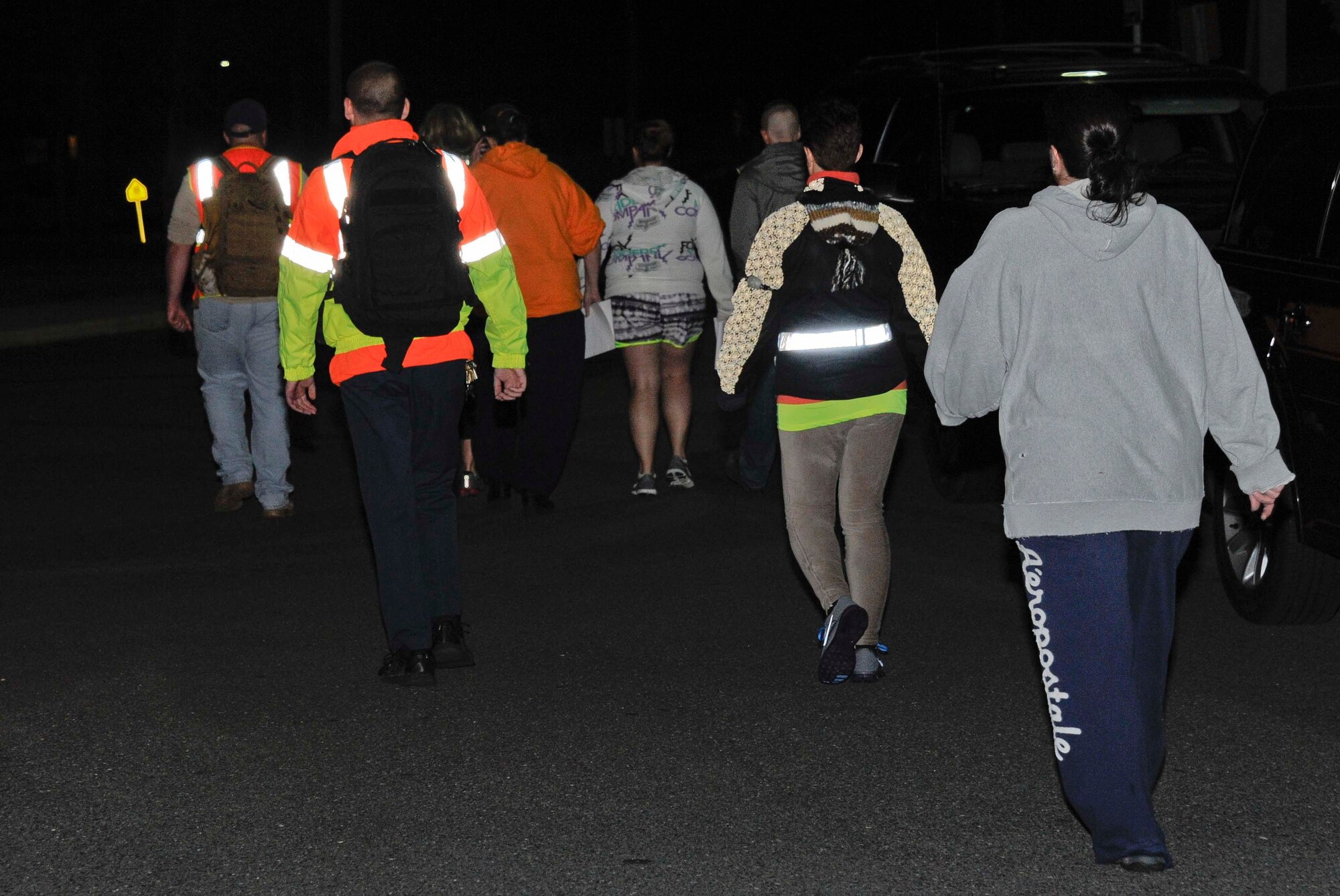 Neighborhood watch volunteers begin their door-to-door search in the Dix housing area after the disappearance of 13-year-old joint base military family member May 8, 2013, at Joint Base McGuire-Dix-Lakehurst, N.J. The teenager was reunited safely with her family after being found walking along Route 206 at approximately 11 a.m. May 9, 2013. (U.S. Air Force photo by Airman 1st Class Ryan Throneberry/Released)
