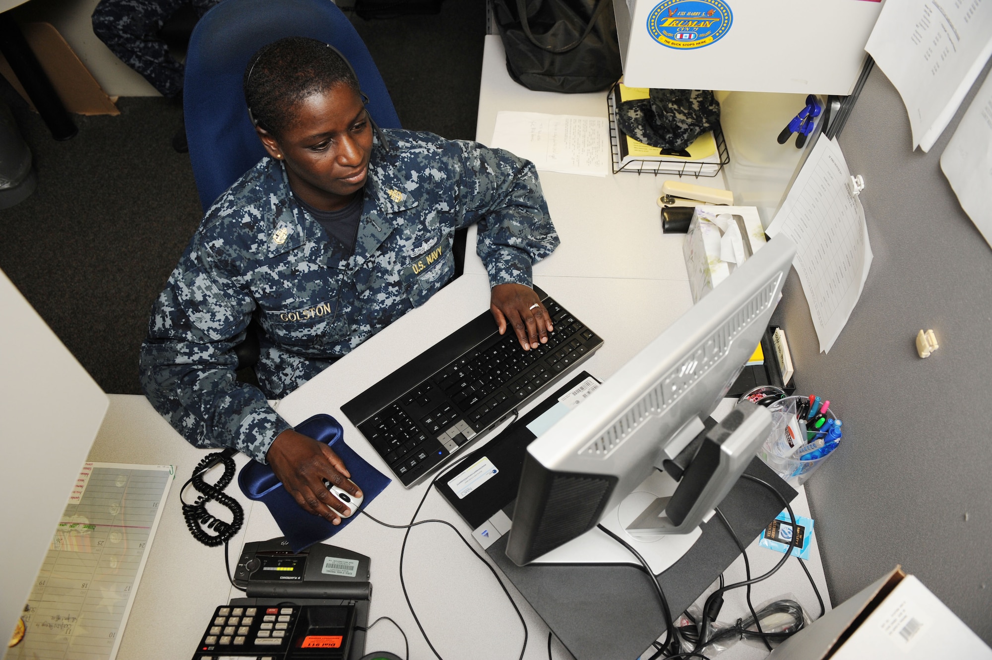 Chief Operations Specialist Tonye Golston reviews job assignments in Career Management System/Interactive Detailing. Golston is a detailer at Navy Personnel Command, which generates permanent change of station orders for more than 328,000 active-duty Sailors. (U.S. Navy photo by Mass Communication Specialist 3rd Class Andrea Smithluedke/Released)
