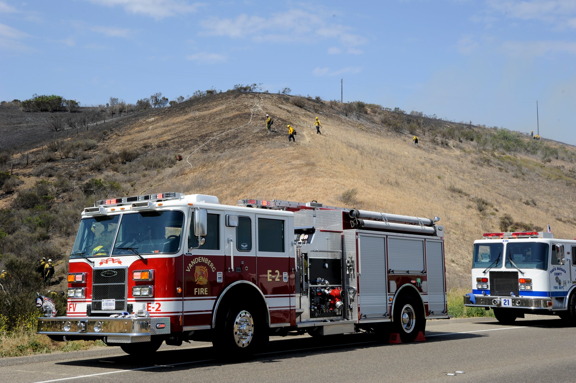 VANDENBERG AIR FORCE BASE, Calif. – A Team V fire engine is staged on the side of Highway 1 as firefighters search a hill to ensure a fire is contained here Wednesday, May 9, 2013. The Vandenberg Fire Department, Santa Barbara County Fire Department and the U.S. Forest Service joined forces to control the 10 acre fire within a two hour time frame. (U.S. Air Force photo/Senior Airman Lael Huss)