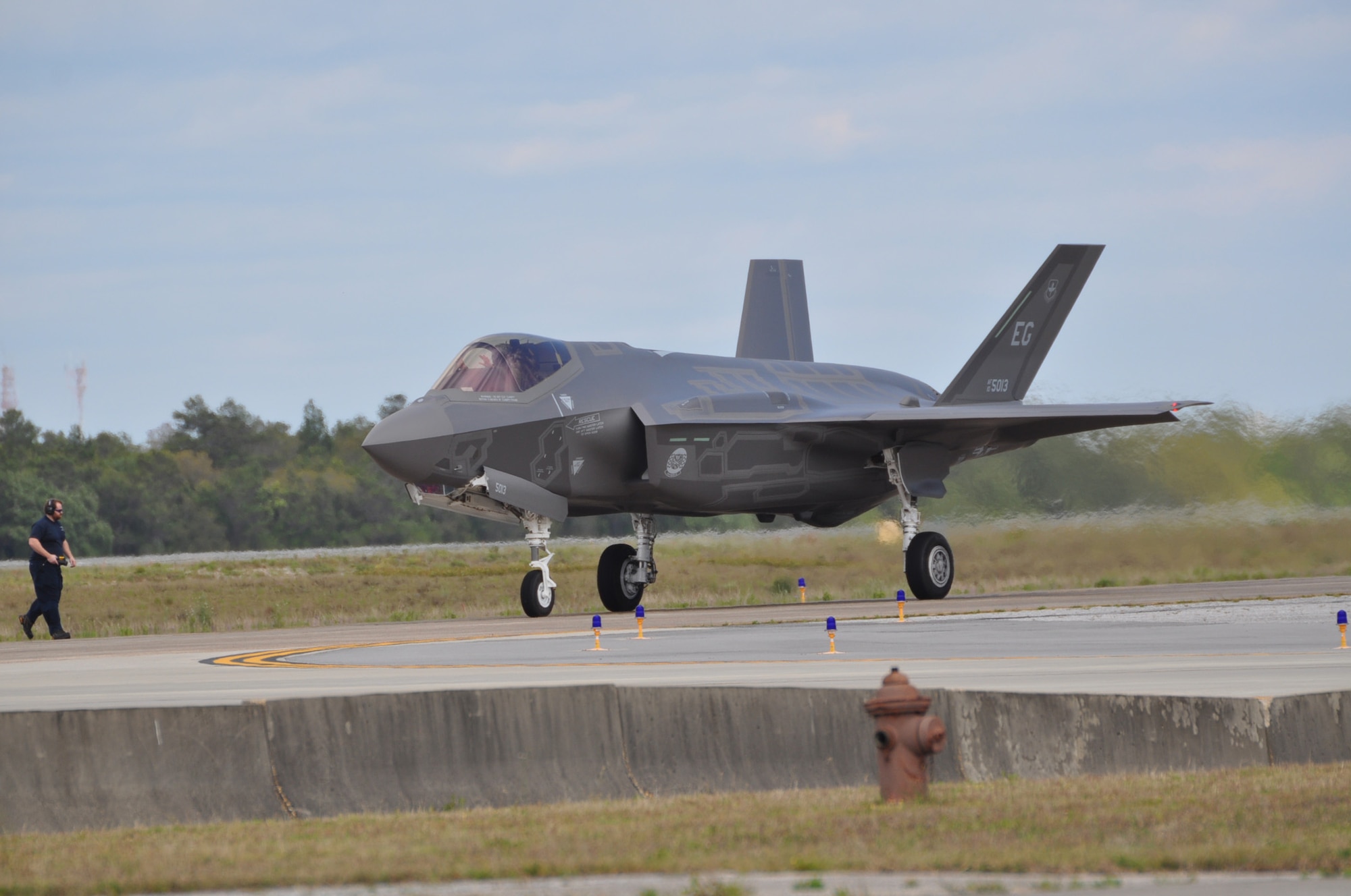 An advanced F-35 Lighting II joint strike fighter taxis on Eglin Air Force Base, Fla. arriving to the Air Education Training Command F-35 schoolhouse, May 6, 2013. The F-35’s arrival will be a major training effort at the schoolhouse, and allow all military branches to train on the newest platform. (U.S. Air Force photo by Staff Sgt. Nicholas Egebrecht)