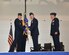 LAS VEGAS, Nev. -- Lieutenant Gen. Robin Rand, left, 12th Air Force Commander, hands Col. Jim Cluff the 432nd Wing flag to signify the passing of command May 3, 2013. Colonel Cluff assumed command of the 432nd Wing and 432nd Air Expeditionary Wing, which have the mission of flying MQ-9 Reaper and MQ-1 Predator aircraft in support of United States and coalition warfighters. (U.S. Air Force photo by Senior Airman A.K./Released)