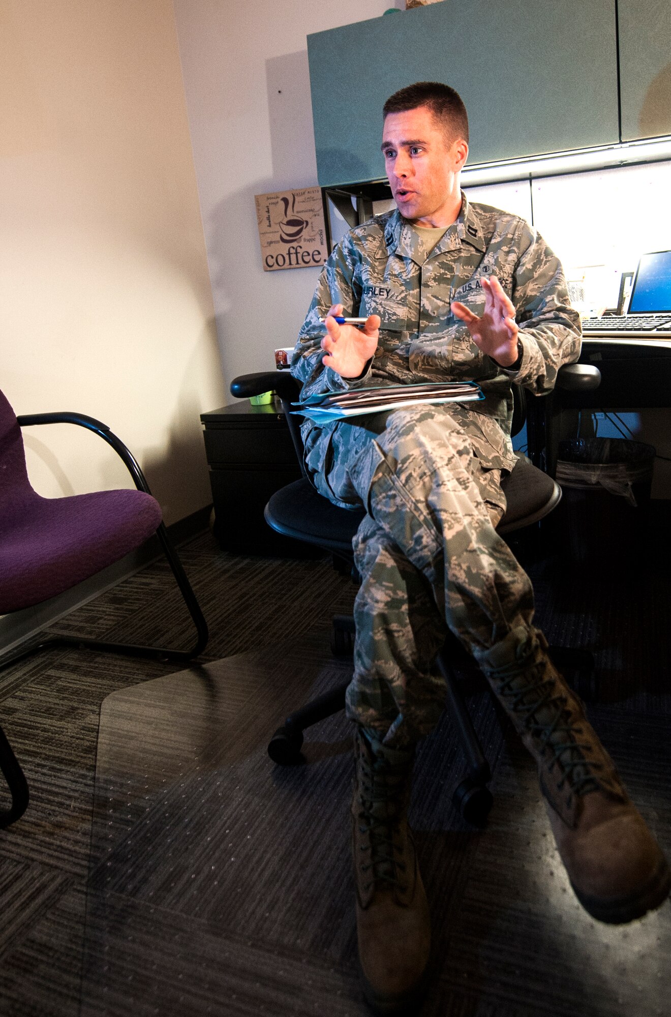 U.S. Air Force Capt. Kevin Hurley, 23d Medical Operations Squadron Mental Health Element chief, asks questions during a simulated session at Moody Air Force Base, Ga., May 8, 2013. Both of Hurley’s parents were in what he considers helping jobs, and he said that likely influenced his decision to also choose a helping profession. (U.S. Air Force photo by Senior Airman Jarrod Grammel/Released)
