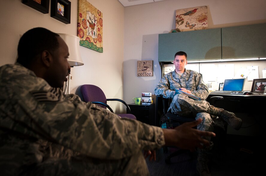 U.S. Air Force Capt. Kevin Hurley, 23d Medical Operations Squadron Mental Health Element chief, listens to an Airman during a simulated session at Moody Air Force Base, Ga., May 8, 2013. Hurley encourages people to see Mental Health at the beginning of an issue and said that 97 percent of the time, people never have any career impacts due to using their services. (U.S. Air Force photo by Senior Airman Jarrod Grammel/Released)
