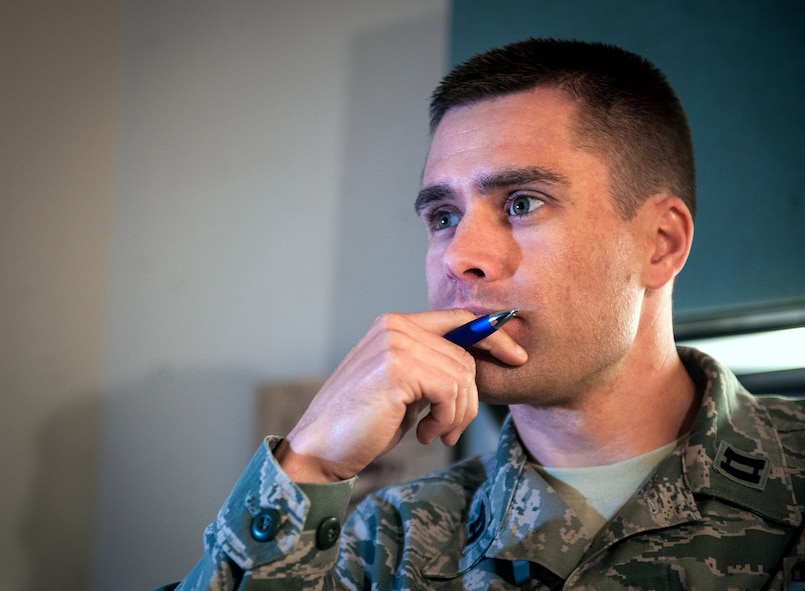 U.S. Air Force Capt. Kevin Hurley, 23d Medical Operations Squadron Mental Health Element chief, listens as an Airman speaks at Moody Air Force Base, Ga., May 8, 2013. Hurley is a clinical psychologist with three psychology degrees, including a doctorate. (U.S. Air Force photo by Senior Airman Jarrod Grammel/Released)
