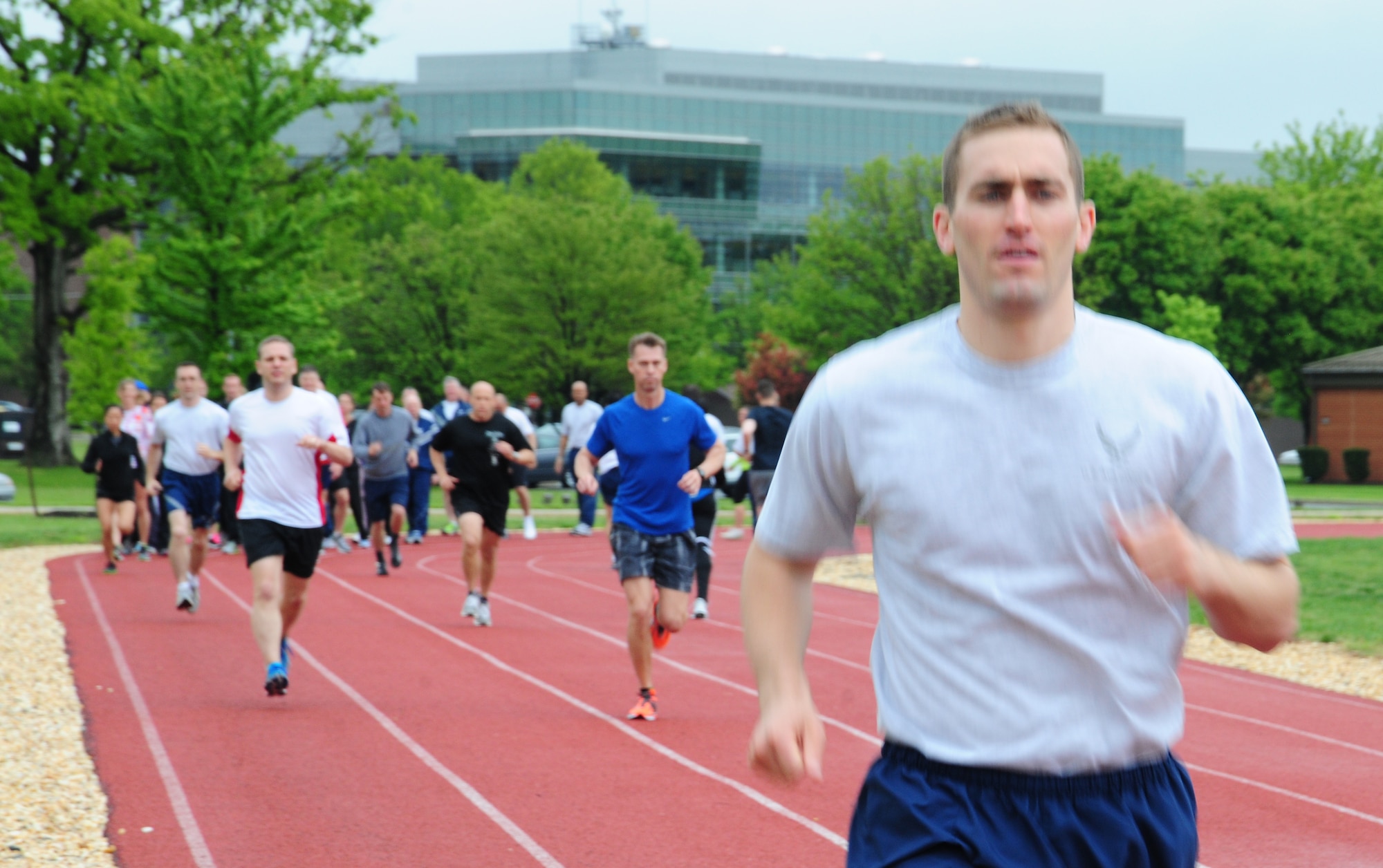 First Lieutenant Jameson Lamie, 11th Force Support Squadron commander and physical training leader, Joint Base Andrews, Md., applies concepts learned during an Efficient Runners Seminar May 7-8, 2013, East Fitness Center.  The Health and Wellness Center sponsored the event. (U.S. Air Force photo/Staff Sgt. Amber Russell)