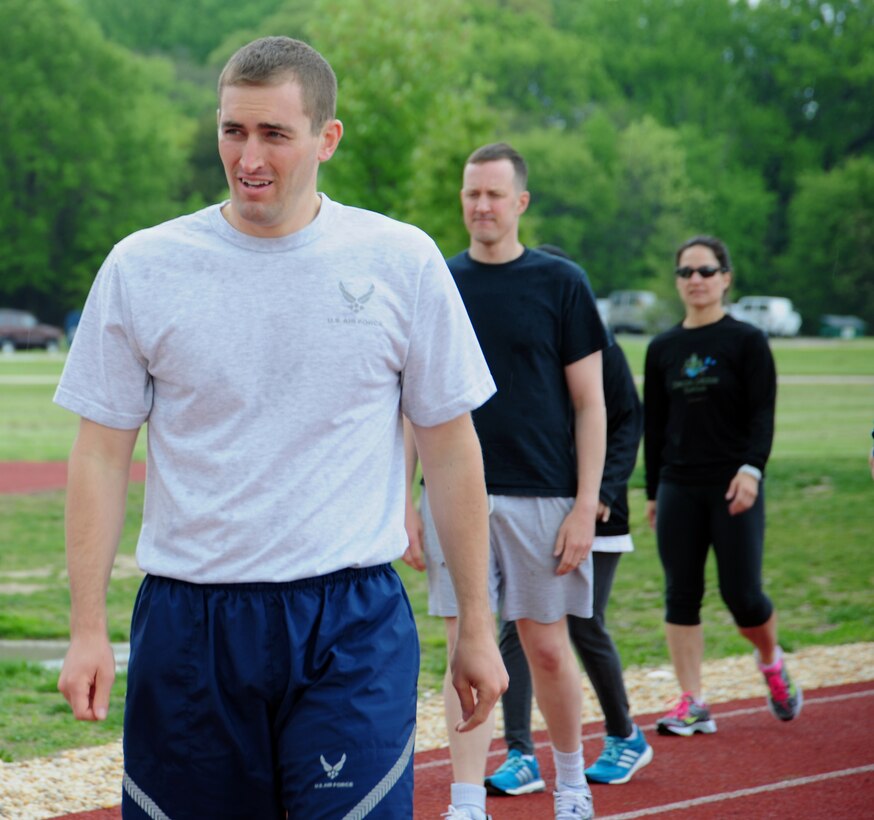 First Lieutenant Jameson Lamie, 11th Force Support Squadron commander and physical training leader, completes a practice run at an Efficient Runners Seminar May 7-8, 2013, at the East Fitness Center.  The Health and Wellness Center sponsored the event. (U.S. Air Force photo/Staff Sgt. Amber Russell)