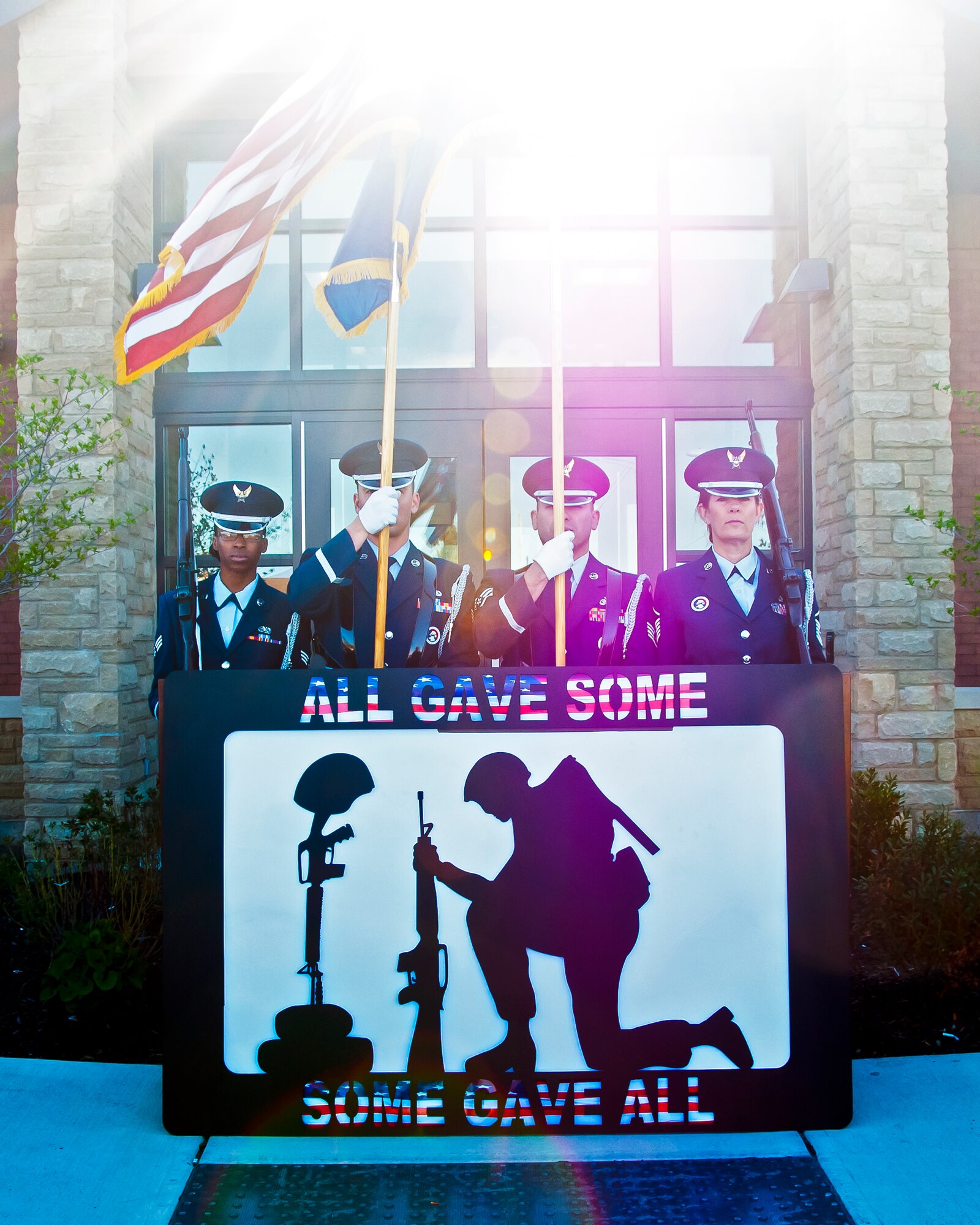 Members of the Niagara Falls Air Reserve Station Honor Guard participate in the dedication of a memorial sculpture being donated by the local chapter of the Patriot Riders, May 5, 2013, Niagara Falls Air Reserve Station, N.Y. The piece titled “Never Forget Silhouette” was created by a Vietnam Veteran, Dan DeCrow to honor the War Dead and Veterans from World War One to the present. This display will be be added to the Heritage Room in the NFARS Community Activity Center. (U.S. Air Force photo by Tech. Sgt. Joseph McKee)  