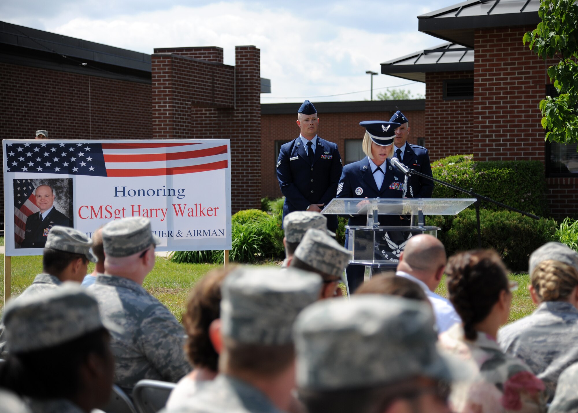 Then Tech. Sgt. Stephanie Rose welcomes guests to the Chief Master Sgt. Harry Walker Center dedication ceremony on May 30, 2012, on Grand Forks Air Force Base, N.D. Master Sgt. Rose was named the base’s Warrior of the Week for the second week of May 2013. (U.S. Air Force photo/Airman 1st Class Ashley Nicole Taylor)