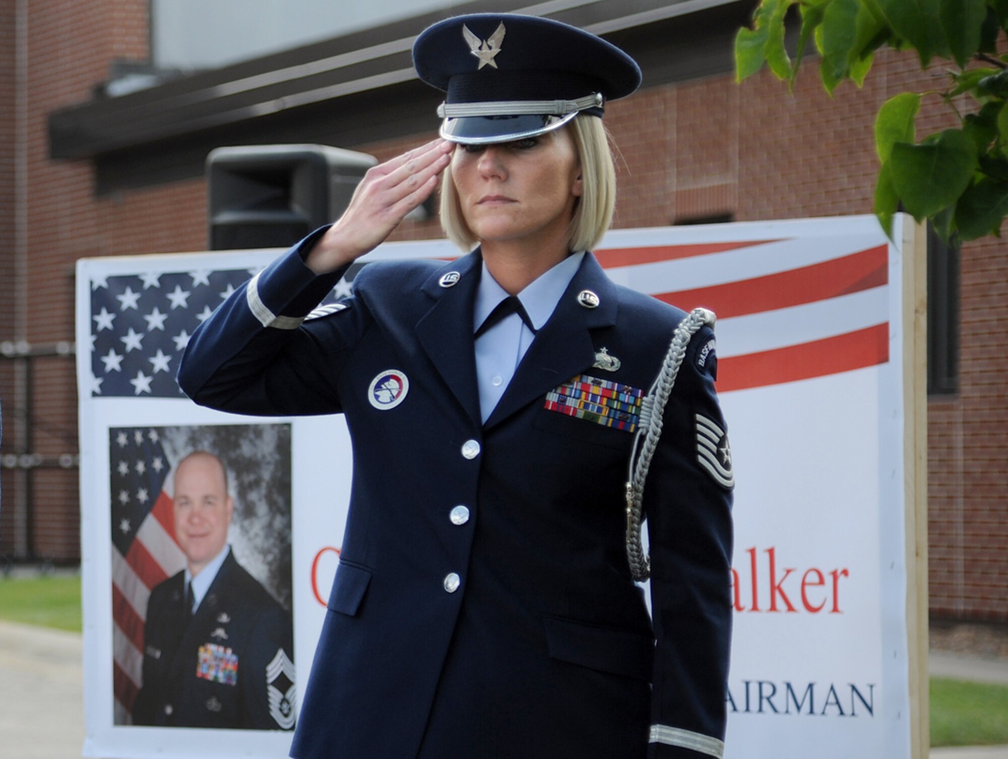 Then-Tech. Sgt. Stephanie Rose, Base Honor Guard program manager, renders proper customs and courtesies during the Chief Master Sgt. Harry Walker Center dedication ceremony on May 30, 2012, on Grand Forks Air Force Base, N.D. Master Sgt. Rose was named the base’s Warrior of the Week for the second week of May 2013. (U.S. Air Force photo/Airman 1st Class Ashley Nicole Taylor)
