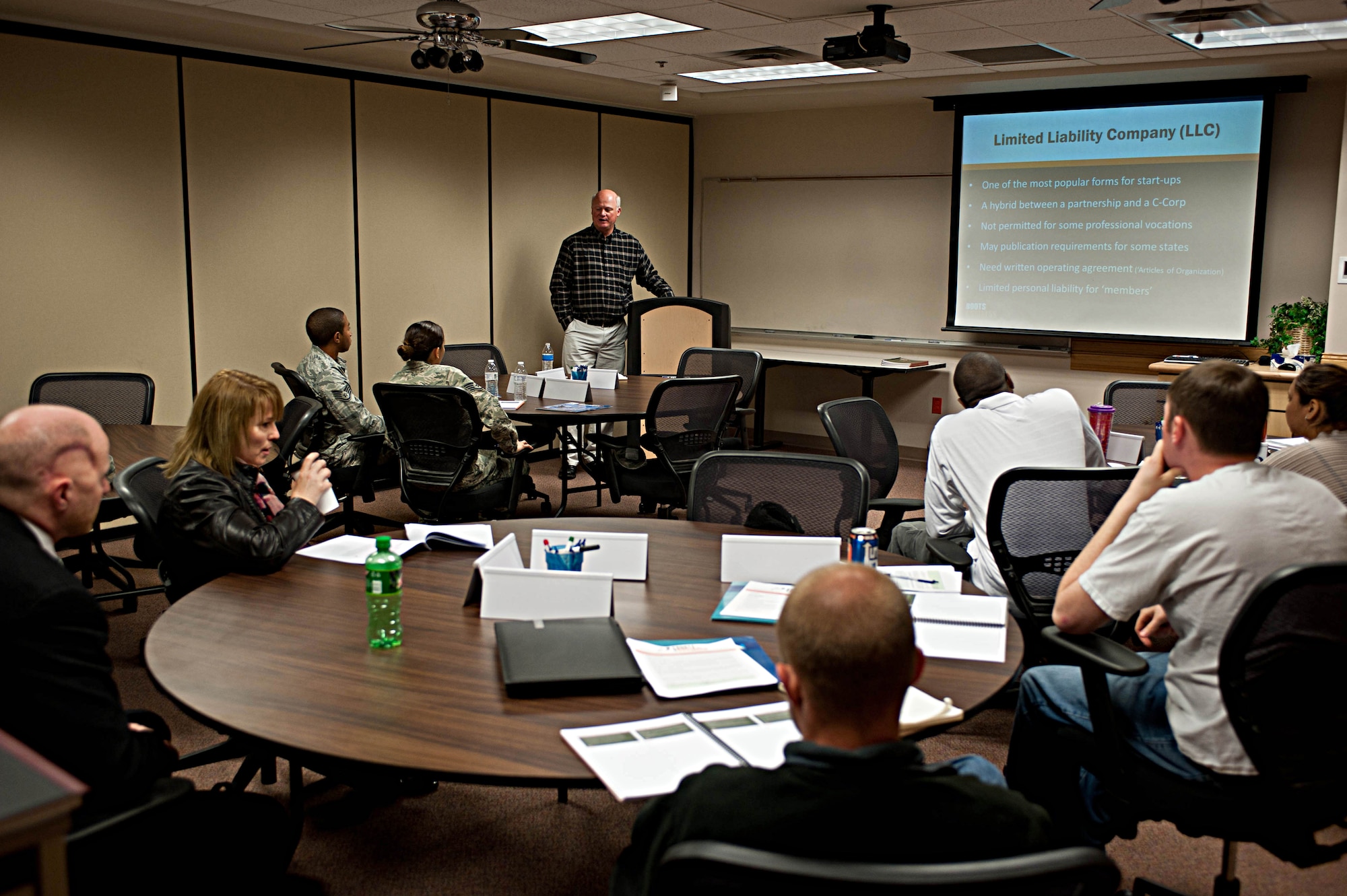 Chuck Hughes, U.S. Small Business Administration South Dakota District Office deputy district director, leads a class called “Boots to Business” for Airmen, family members and veterans at the Airman and Family Readiness Center at Ellsworth Air Force Base, S.D., May 1, 2013. Through the “Boots to Business” initiative, servicemembers will learn the ins and outs of how to start and grow a business, and gain the knowledge, tools and resources they will need to evaluate opportunities and become successful entrepreneurs. (U.S. Air Force photo by Airman 1st Class Zachary Hada/Released)
