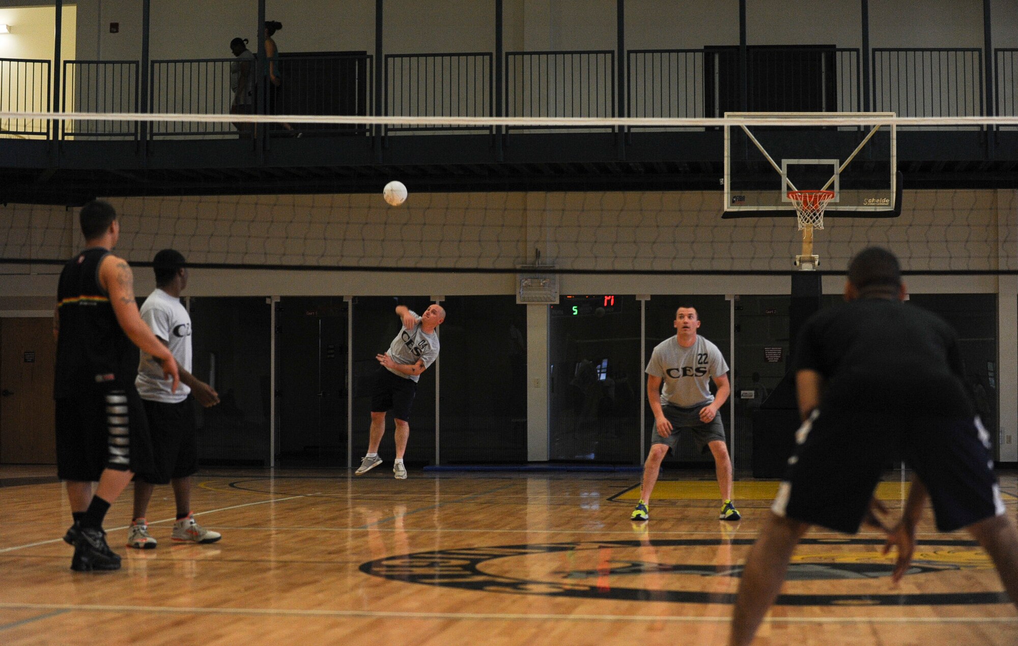 Joseph Hosak, a 19th Civil Engineer Squadron team captain, serves the ball to start the game May 7, 2013, at Little Rock Air Force Base, Ark. The 19th CES had a record of 3-1 going into this game. (U.S. Air Force photo by Airman 1st Class Cliffton Dolezal)