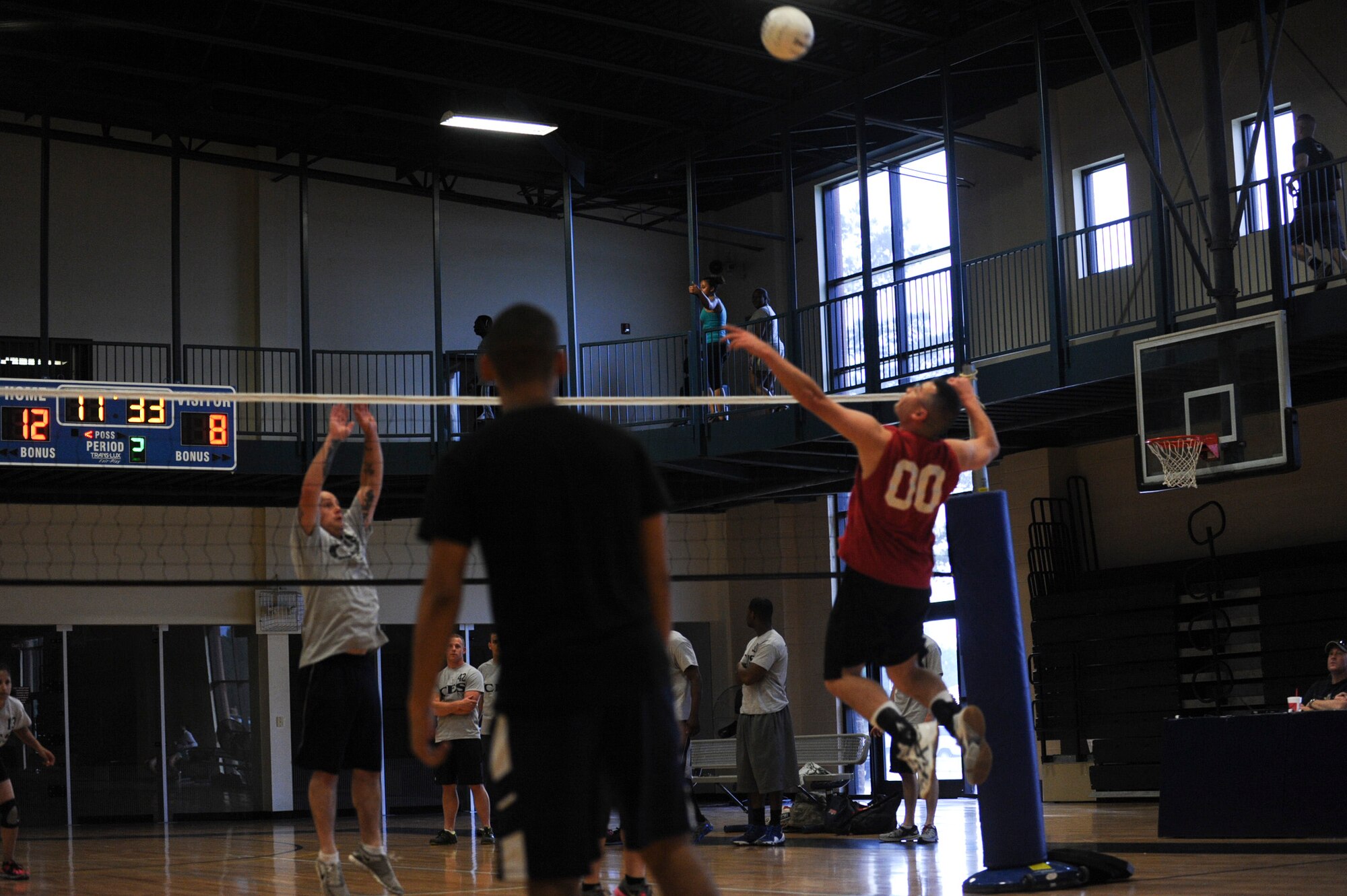 Charles Stacey, a 19th Force Support Squadron alternate team captain, spikes the ball May 7, 2013, at Little Rock Air Force Base, Ark. The 19th FSS started out strong winning the first game and wrapping up the series in three. (U.S. Air Force photo by Airman 1st Class Cliffton Dolezal)
