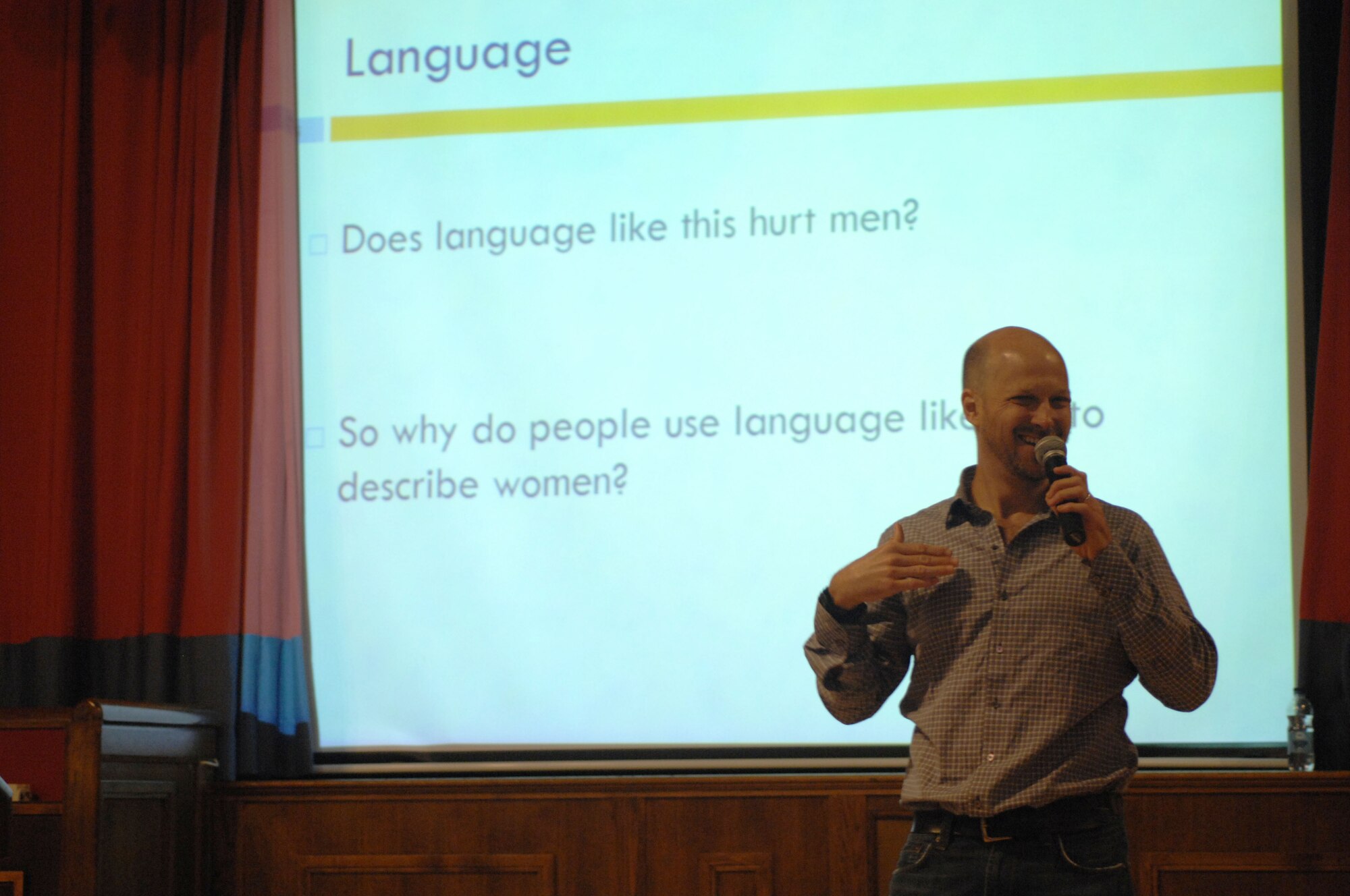 Christian Murphy, Catharsis Productions executive director from Chicago, speaks to Airmen about how people describe different genders during the presentation “The Hook-up” May 8, 2013, at the Galaxy Club on RAF Mildenhall, England. “The Hook-up” is a presentation geared toward Airmen ages 18 to 25 and it covered topics such as sexual assault and how to prevent it. Catharsis is used by the DOD through all services to teach service members sexual assault awareness. (U.S. Air Force photo by Airman 1st Class Dillon Johnston/Released)