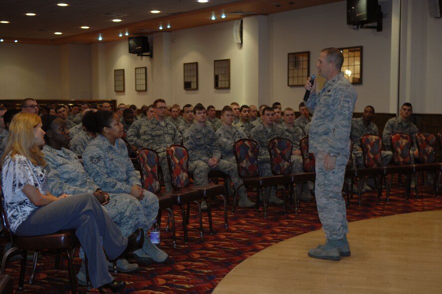 Col. Kyle Voigt, 100th Air Refueling Wing vice commander, speaks to Team Mildenhall Airmen before the presentation “The Hook-up” May 8, 2013, at the Galaxy Club on RAF Mildenhall, England. RAF Mildenhall hosted the presentation as a wrap-up to Sexual Assault Awareness Month. “The Hook-up” is a presentation geared toward Airmen ages 18 to 25 and it discussed topics such as sexual assault and how to prevent it. (U.S. Air Force photo by Airman 1st Class Dillon Johnston/Released)