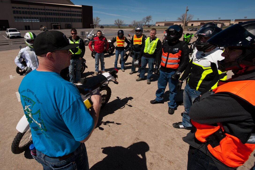 Tech. Sgt. Kevin Capach, 28th Logistics Readiness Squadron fuels environmental coordinator, explains an upcoming riding exercise to motorcyclists during a beginners motorcycle safety course on Ellsworth Air Force Base, S.D., May 3, 2013. The course is designed to introduce new riders the correct way to operate a motorcycle as well as help prepare them to handle a variety of situations unique to motorcycle riding. (U.S. Air Force photo by Senior Airman Kate Maurer/Released)