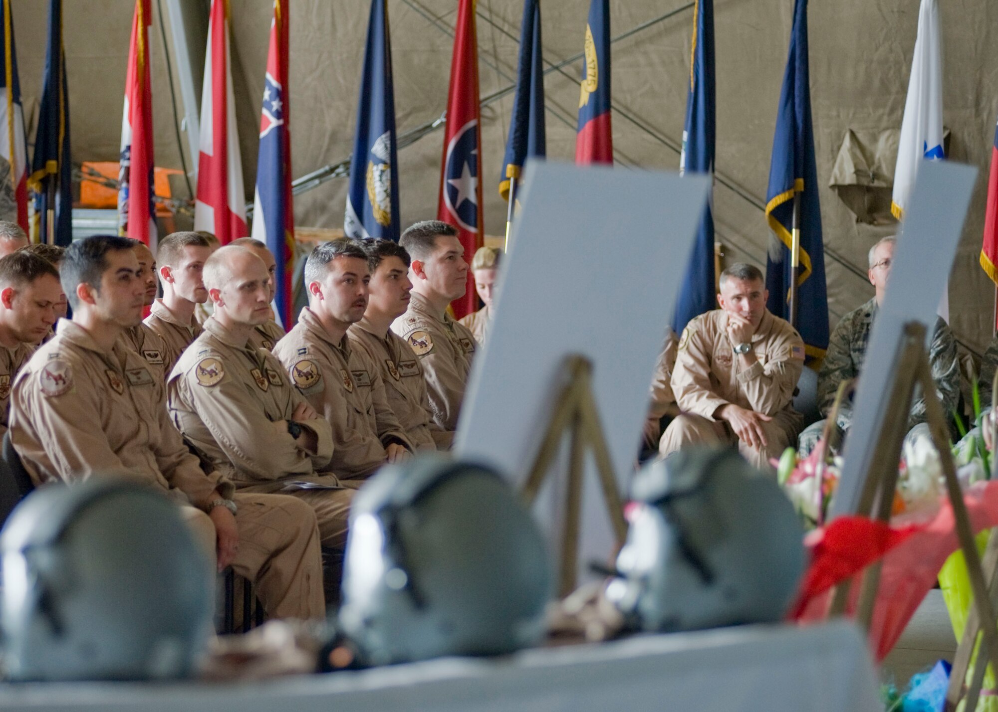 More than 300 U.S. service members attended a memorial service held in honor of the fallen crew members of Shell 77 May 9, 2013, at Transit Center at Manas, Kyrgyzstan. The three Airmen perished May 3, 2013, when their KC-135 Stratotanker crashed in, northern Kyrgyzstan. (U.S. Air Force photo/Staff Sgt. Stephanie Rubi)