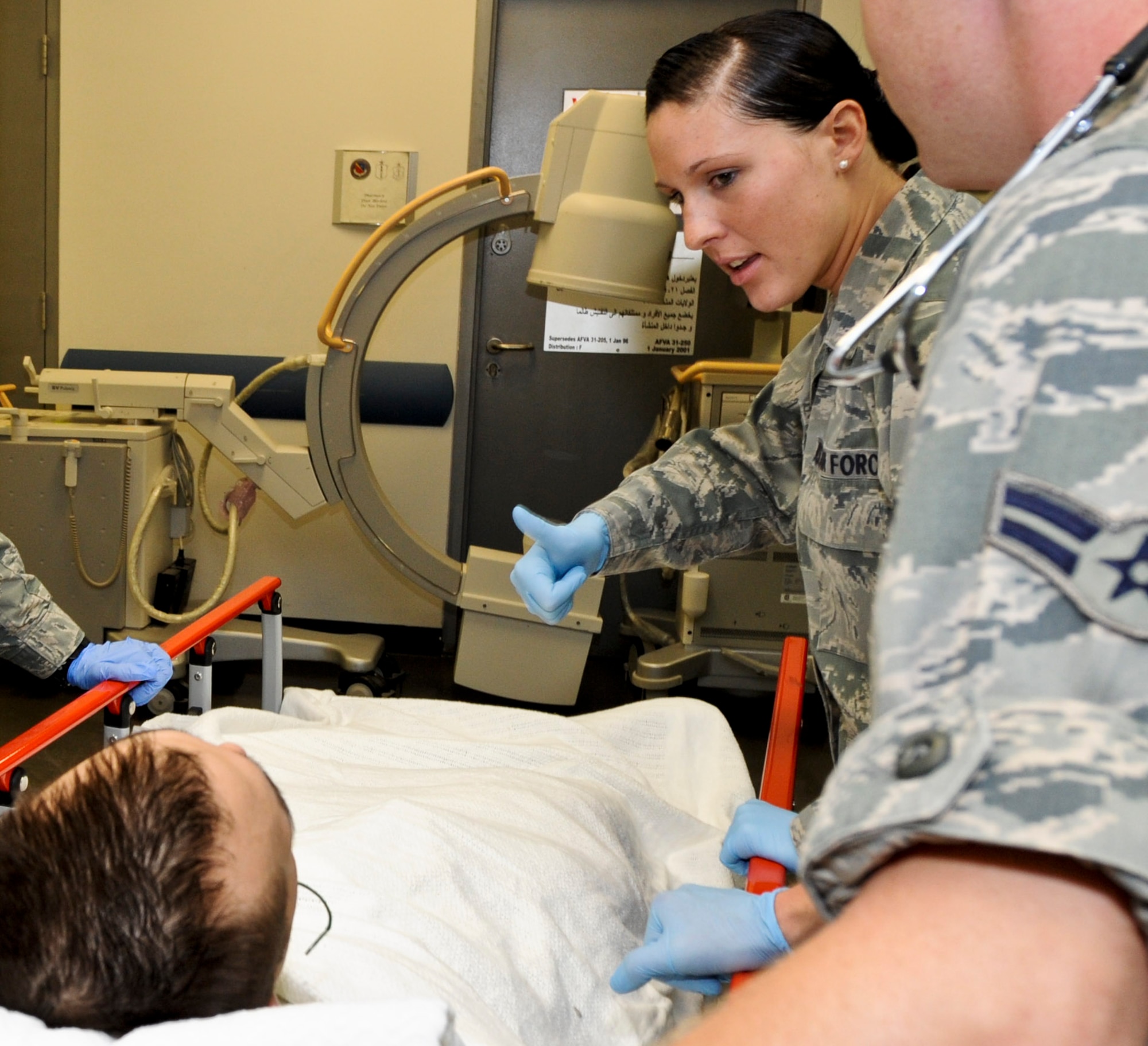 Senior Airman Sonni Hamill, 379th Expeditionary Medical Operations Squadron medical technician, gives the mock patient a ‘thumbs-up’ as she practices her skills, May 9, 2013, at the 379th Air Expeditionary Wing’s medical facility. Hamill deployed here from Joint Base Langley-Eustis, Va. The Air Force Medical Service celebrates Nurse and Medical Technician week May 6 - 12. Nurses and medical technicians — Active Duty, Reserve, Guard, civilians and contractors — support U.S. servicemen and women across the globe. (U.S. Air Force photo/Senior Airman Benjamin Stratton)