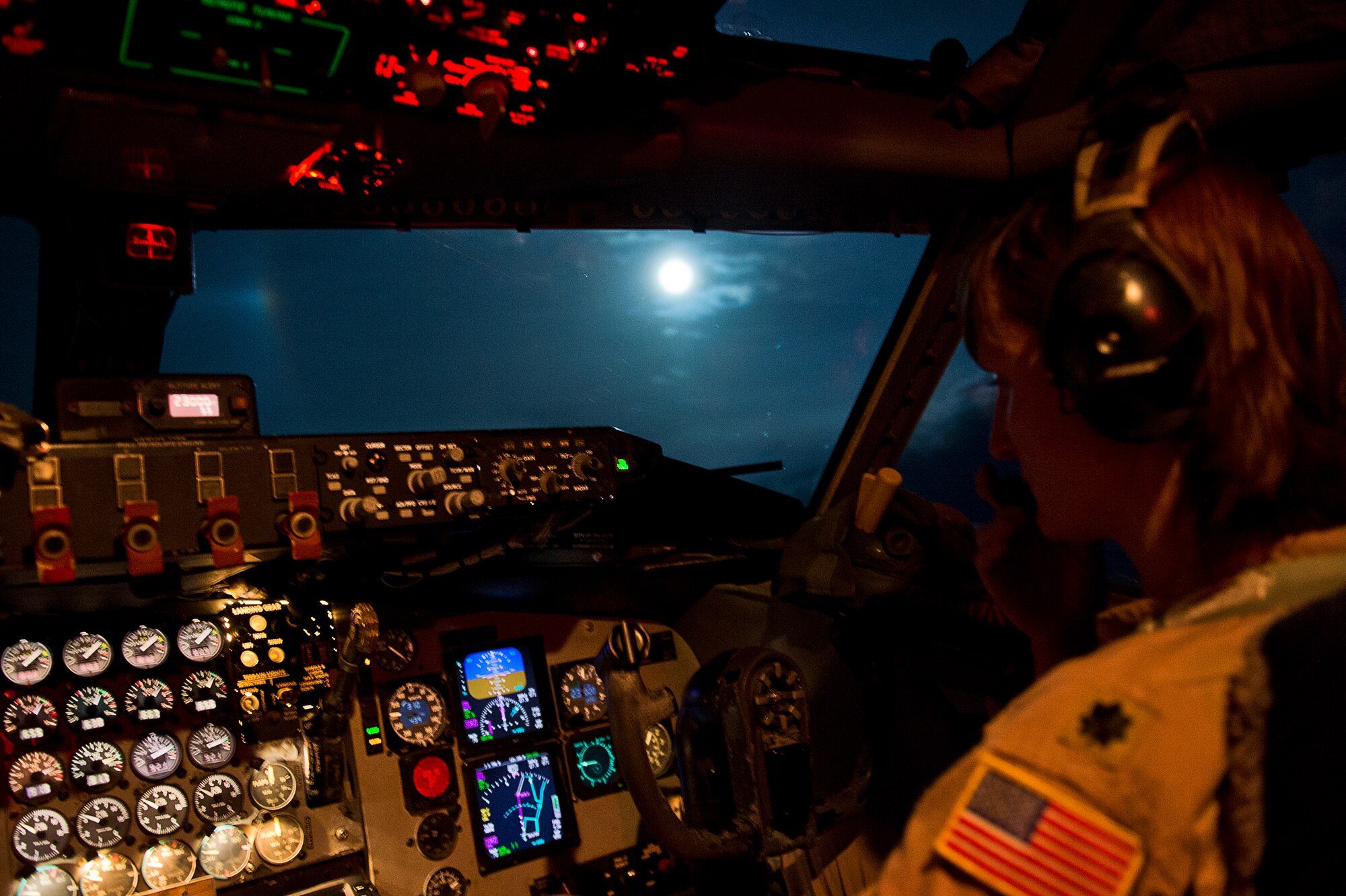 Lt. Col. Leah Schmidt, a 340th Expeditionary Air Refueling Squadron KC-135 Stratotanker pilot, checks her flight instruments after taking off from an undisclosed air base, Southwest Asia, April 25. The mission supported air operations in and around Afghanistan as part of Operation Enduring Freedom. Schmidt is deployed from the 18th Air Refueling Squadron, McConnell Air Force Base, Kan. (U.S. Air Force photo/Staff Sgt. Alexander Martinez)