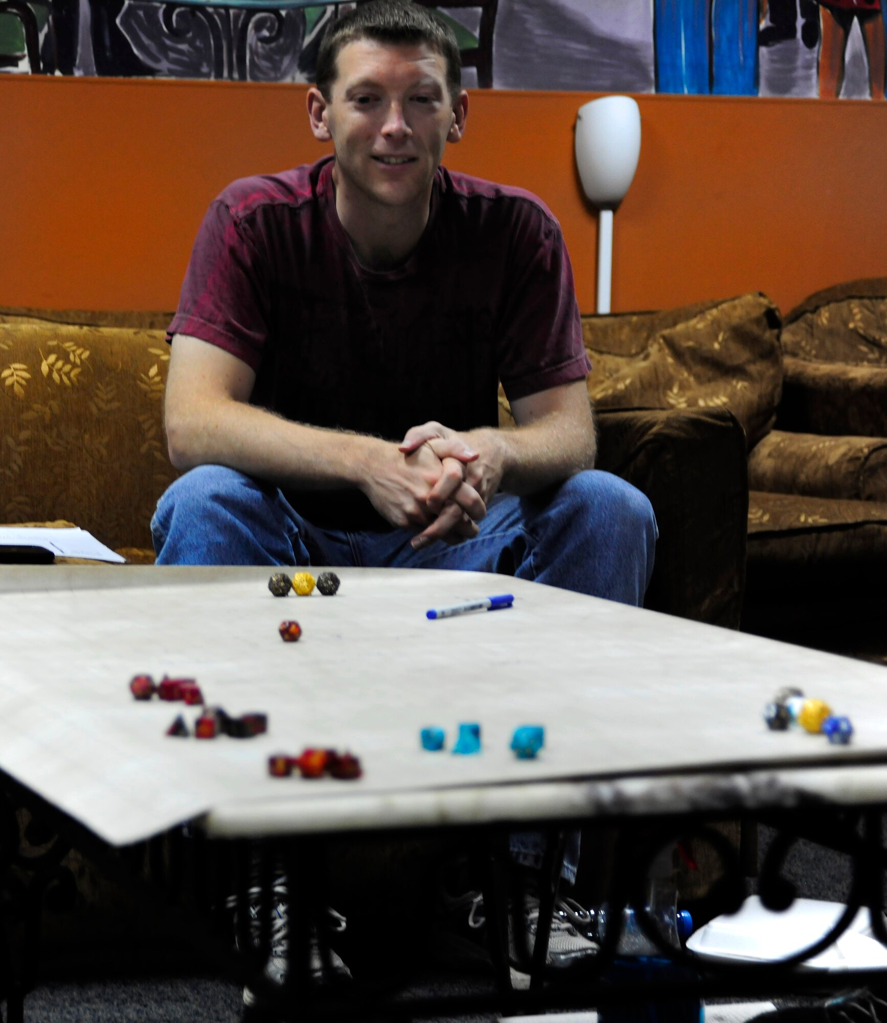 Tech. Sgt. Shannon Fromm, member of Incirlik Tabletop Warriors, overlooks the game board during a role-playing game May 8, 2013, at Incirlik Air Base, Turkey. Role playing, war gaming and board games are frequently played by ITTW members. (U.S. Air Force photo by Senior Airman Anthony Sanchelli/Released)

