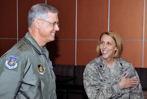 U.S. Air Force Lt. Col. Denise Emery, 35th Force Support Squadron commander, gives Lt. Gen. Sam Angelella, U.S. Forces, Japan, and 5th Air Force commander, a tour of the newly renovated Café Mokuteki at Misawa Air Base, Japan, May 7, 2013. During his visit to the base, Angelella spent two days visiting Airmen in their work sections and touring renovated facilities. (U.S. Air Force photo by Airman 1st Class Zachary Kee)