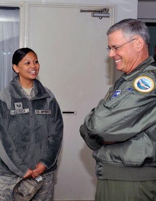 U.S. Air Force Staff Sgt. Melissa Estrada, 35th Civil Engineer Squadron dorm manager, briefs Lt. Gen. Sam Angelella, U.S. Forces, Japan, and 5th Air Force commander, during his visit at Misawa Air Base, Japan, May 7, 2013. While visiting the base, Angelella visited newly renovated facilities and various work sections. (U.S. Air Force photo by Airman 1st Class Zachary Kee) 