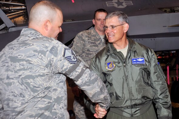 U.S. Air Force Lt. Gen. Sam Angelella, U.S. Forces, Japan, and 5th Air Force commander, shakes hands with Master Sgt. James Herring, 35th Maintenance Squadron fabrication flight chief, after a brief at Misawa Air Base, Japan.  During a two-day visit, Angelella spoke with Airmen and visited various locations around base. (U.S. Air Force photo by Airman 1st Class Zachary Kee)