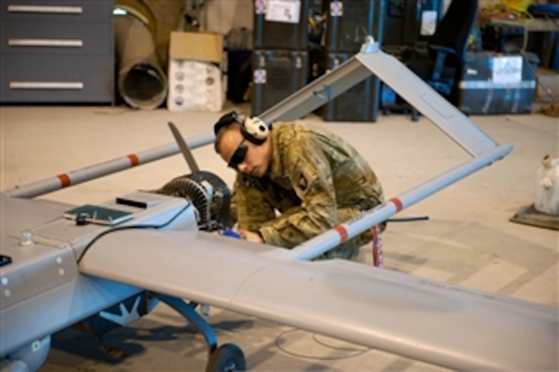 U.S. Army Spc. Tyler Brewer performs a pre-flight inspection on an RQ-7B Shadow Tactical Unmanned Aircraft System at Forward Operating Base Fenty in the Nangarhar province of Afghanistan on May 2, 2013.  Brewer is an unmanned aircraft systems repair and technical inspector with Bravo Company, 1st Special Troops Battalion, 1st Brigade Combat Team, 101st Airborne Division.  