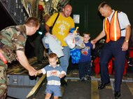 These individuals were evacuated from Keesler Air Force Base, Mississippi, due to flooding from Hurricane Katrina on August 30, 2005.  They were transported by the Mississippi Air National Guard on a C17 to Kelly City Base USA.(United States Air Force photo by Senior Airman Heather M. Norris)