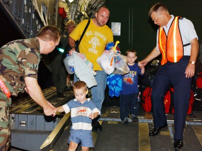 These individuals were evacuated from Keesler Air Force Base, Mississippi, due to flooding from Hurricane Katrina on August 30, 2005.  They were transported by the Mississippi Air National Guard on a C17 to Kelly City Base USA.(United States Air Force photo by Senior Airman Heather M. Norris)