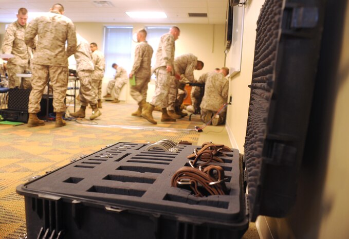 Marines turn in their tests after a chaser course at Yale Hall aboard Marine Corps Base Quantico, on May 6, 2013. Marines practiced using restraints as part of their training.