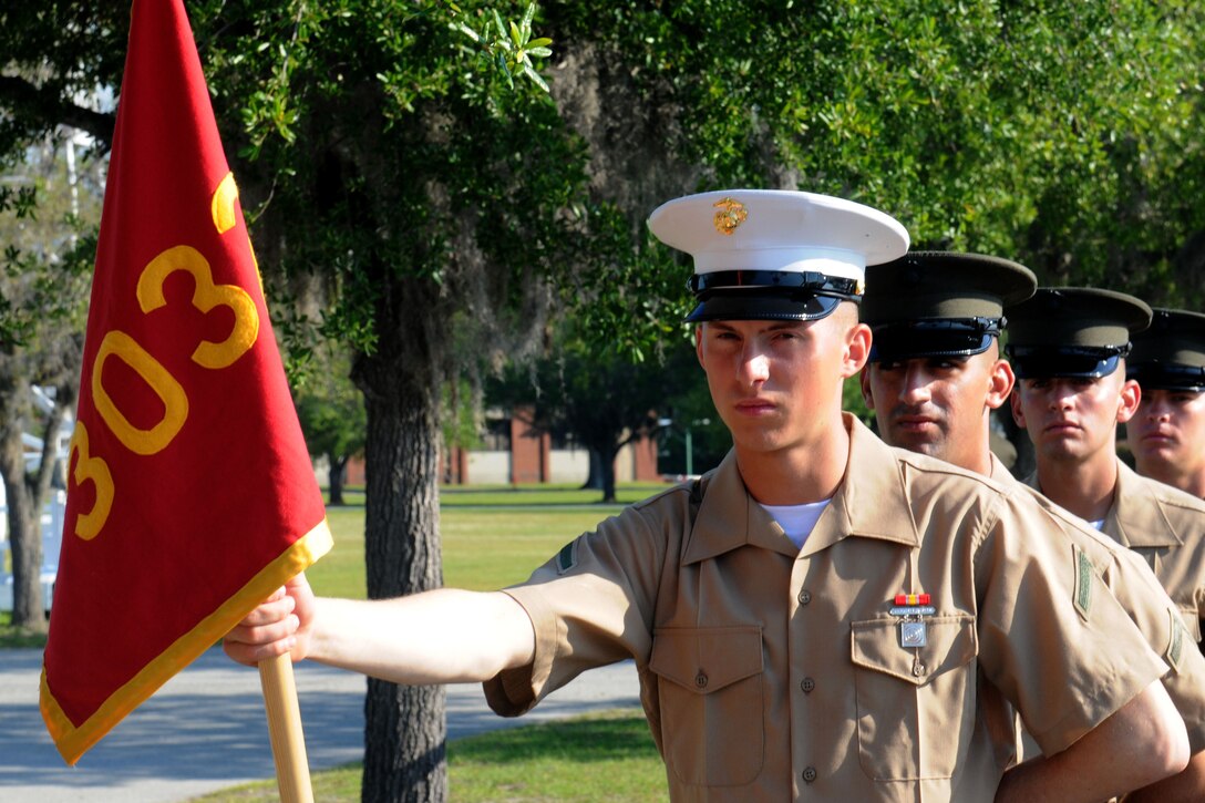 Private First Class Frederick R. Broome III, honor graduate of platoon 3032, stands at parade rest before graduation starts aboard Parris Island, S.C., May 10, 2013. Broome is a native of Leesburg, Ga., and was recruited from Columbus, Ga. Broome will be able to enjoy some much deserved leave as he prepares for the School of Infantry in Camp Geiger, N.C. (U.S. Marine Corps photo by Pfc. Stanley Cao)