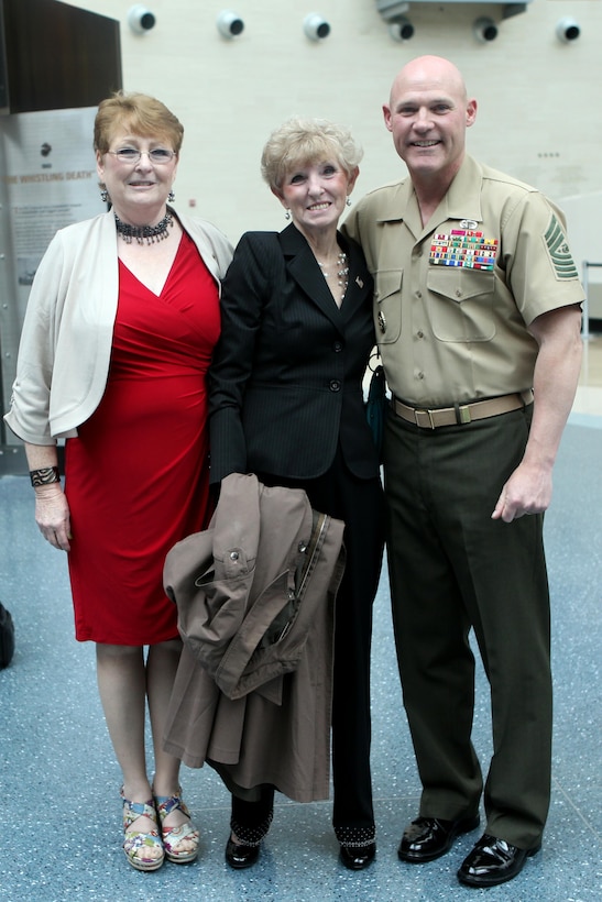 Sgt. Maj. Micheal P. Barrett, the 17th Sergeant Major of the Marine Corps, and sisters of Sgt. Walter K. Singleton, a Vietnam War Medal of Honor recipient, at the National Museum of the Marine Corps in Triangle, Va., on May 8, 2013. (U.S. Marine Corps photo by Sgt. Marionne T. Mangrum)