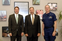 Dept. of Homeland Security Chief of Staff Mr. John Wood (left) and Dept. of Homeland Security Senior Military Advisor Rear Adm. Daniel B. Lloyd (right) traveled to Colorado Springs Friday to announce the selection of Mr. William Brundage (center) as Senior Dept. of Homeland Security Advisor to NORAD-USNORTHCOM. 