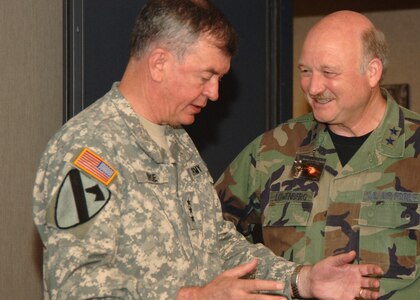 Lt. Gen. Joseph Inge, USNORTHCOM deputy director, talks with Maj. Gen. Tim Lowenberg, The Adjutant General of Washington and chairman of the AGAUS Homeland Security Committee.