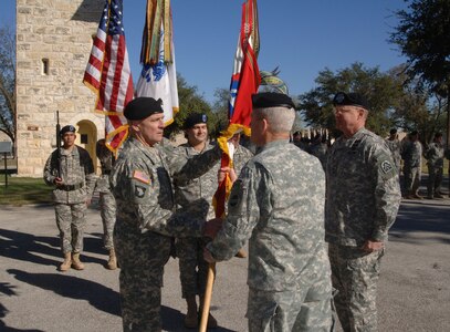 General Dan K. McNeill, Commander of United States Army Forces Command, passes the colors to Lt. Gen. Thomas R. Turner, incoming Commander of United States Army North, during a change of command ceremony at Ft. Sam Houston, Texas. 