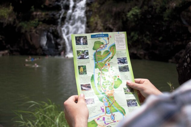 HALEIWA, Hawaii — A visitor looks at his map of the trails in Waimea Valley, April 28. There are short paths leading off the main path, which leads people to small streams, a variety of plant life, and historical points of interest. (U.S. Marine Corps photo by Lance Cpl. Janelle Y. Chapman) 