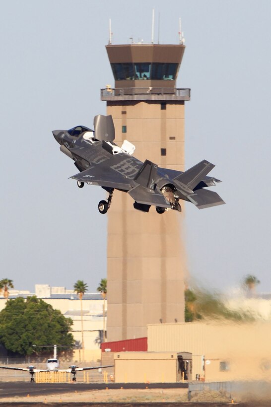 An F-35B Lightning II from Marine Fighter Attack Squadron 121 out of Marine Corps Air Station Yuma, Ariz. conducts short landing and takeoff flight operations on station, May 9, 2013. This photo was taken during a media day at MCAS Yuma, which exposed numerous external media to interviews and flight operations of VMFA-121, Marine Attack Squadron 211's AV-8B Harriers and Marine Fighter Training Squadron 401's F-5N Aggressors.