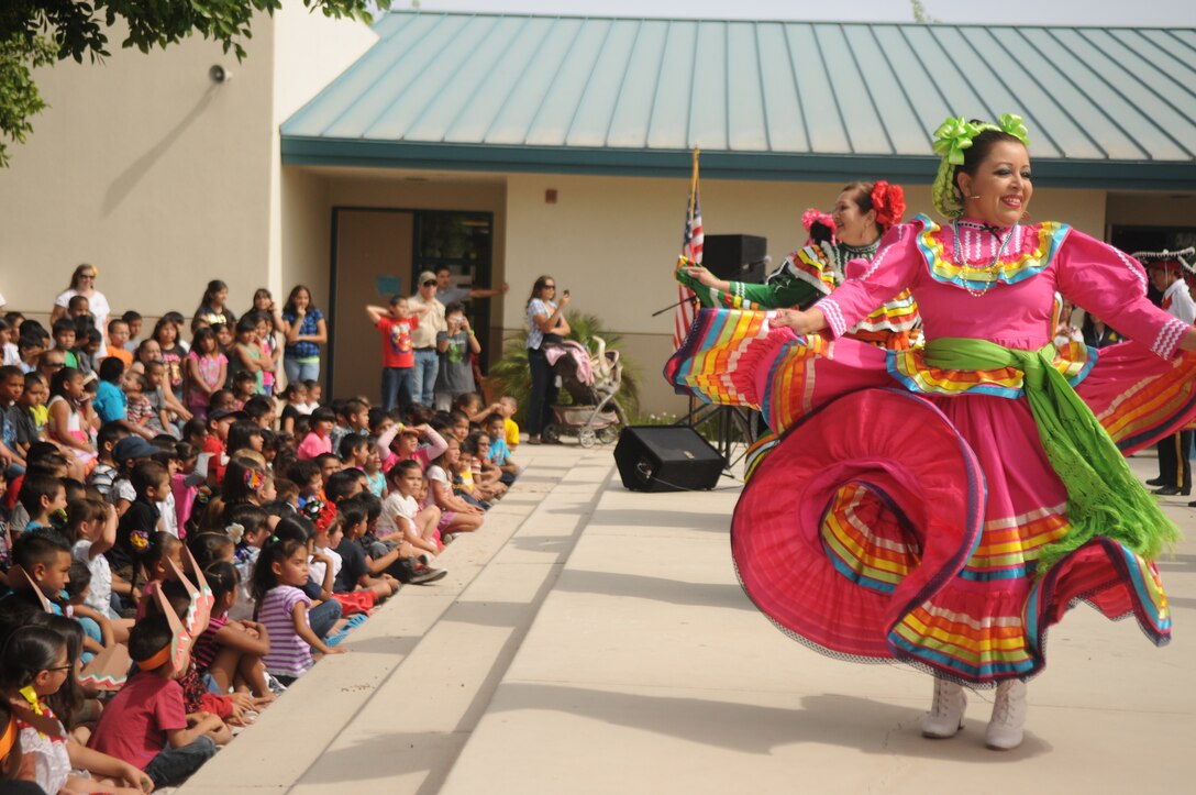 Marines from Marine Attack Squadron 211, based out of Marine Corps Air Station Yuma, watched their adopted students at George Carver Elementary school perform traditional Mexican heritage performances as part of their end of the school year Cinco De Mayo bash, May 3. Teachers joined in on one of the performances that they’ve been choreographing with the students for several weeks.