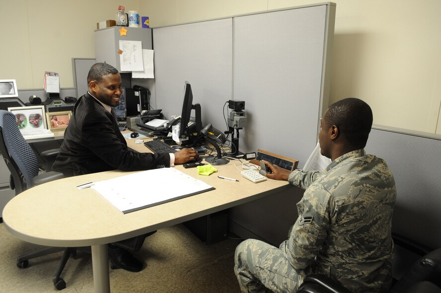 George King, 2nd force Support Squadron Military Personnel Section verifying official, updates information for Airman 1st Class Desmond Awadzi, 2nd FSS reenlistments and extensions journeyman, on Barksdale May 3. The MPS provides military personnel services and programs for active duty members and their families, Guard and Reserve members, and military retirees including identification cards, defense eligibility enrollment system, citizenship and more.