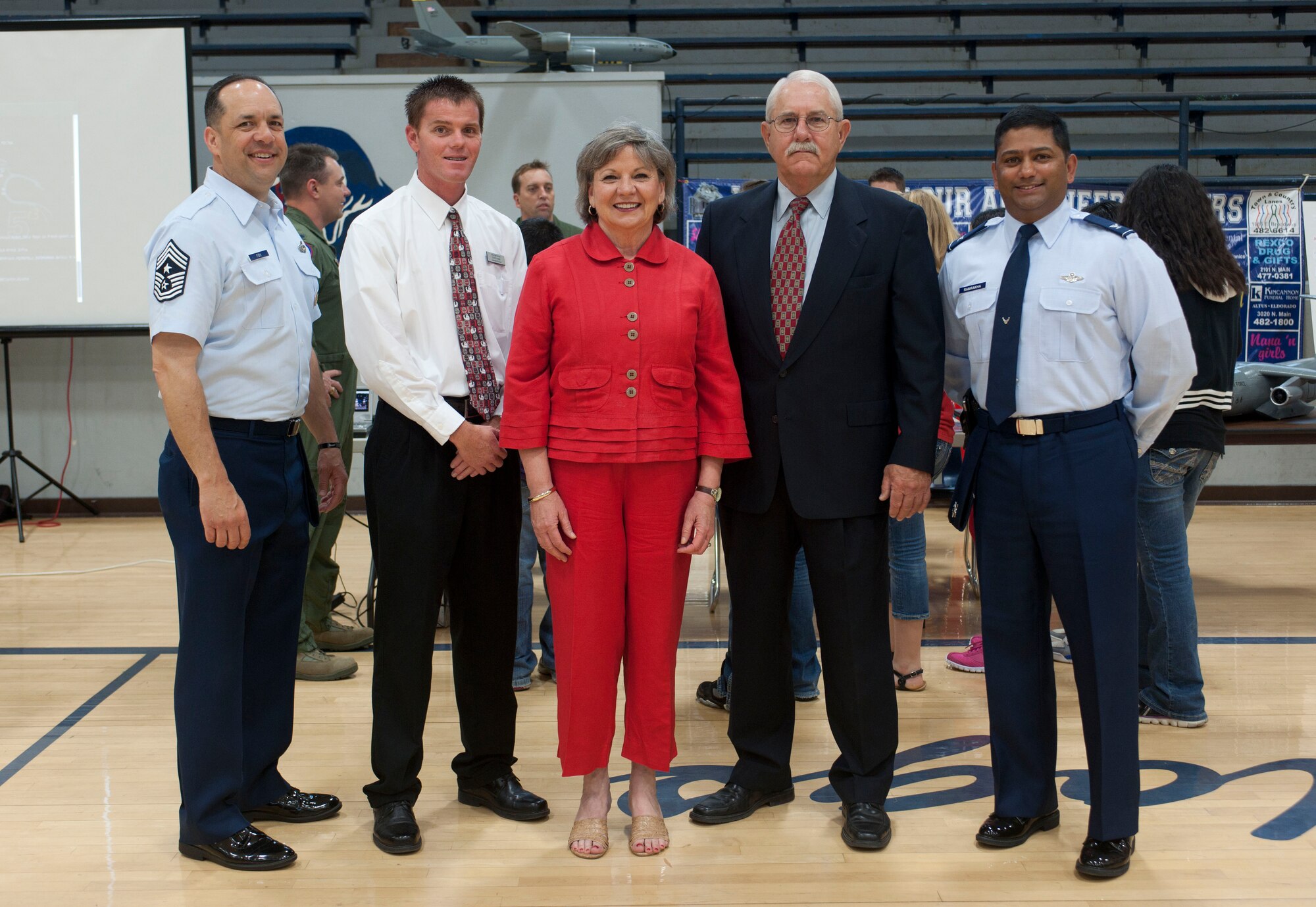 ALTUS, Okla. – Chief Master Sgt. David Fish, 97th Air Mobility Wing command chief, and Col. Sushil Ramrakha, 97th Air Mobility Wing vice commander, pose with Altus education administrators during the Science, Technology, Engineering, and Mathematics Fair at Altus High School, May 9. The event was created to encourage student to pursue careers in the STEM field and give them a chance to experience those careers first hand. The vision at Altus AFB is to encourage and increase STEM education in local schools with incentive-based programs; making learning fun for teachers and students grade K-12. (U.S. Air Force Photo by Senior Airman Jesse Lopez / Released)