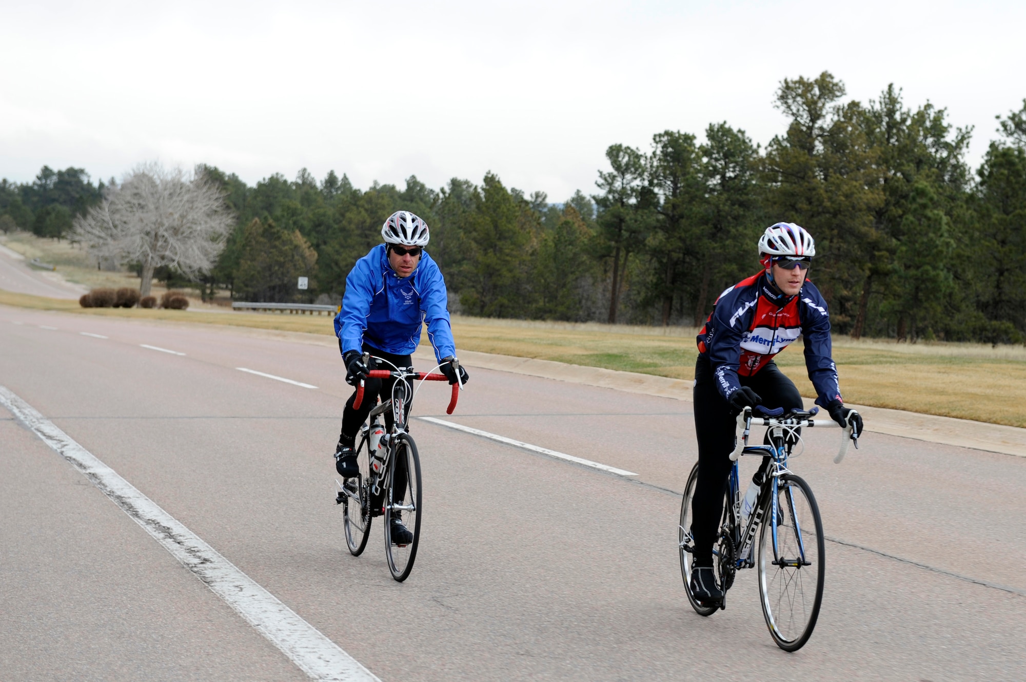 Master Sgt. Shawn Schwantes, left, and Capt. Mitchell Kieffer bike ride at the Academy during the Wounded Warrior Games Training Camp held in Colorado Springs, Colo., April 15, 2013. Schwantes is stationed at Joint Base San Antonio-Lackland. (U.S. Air Force photo/Desiree N. Palacios)