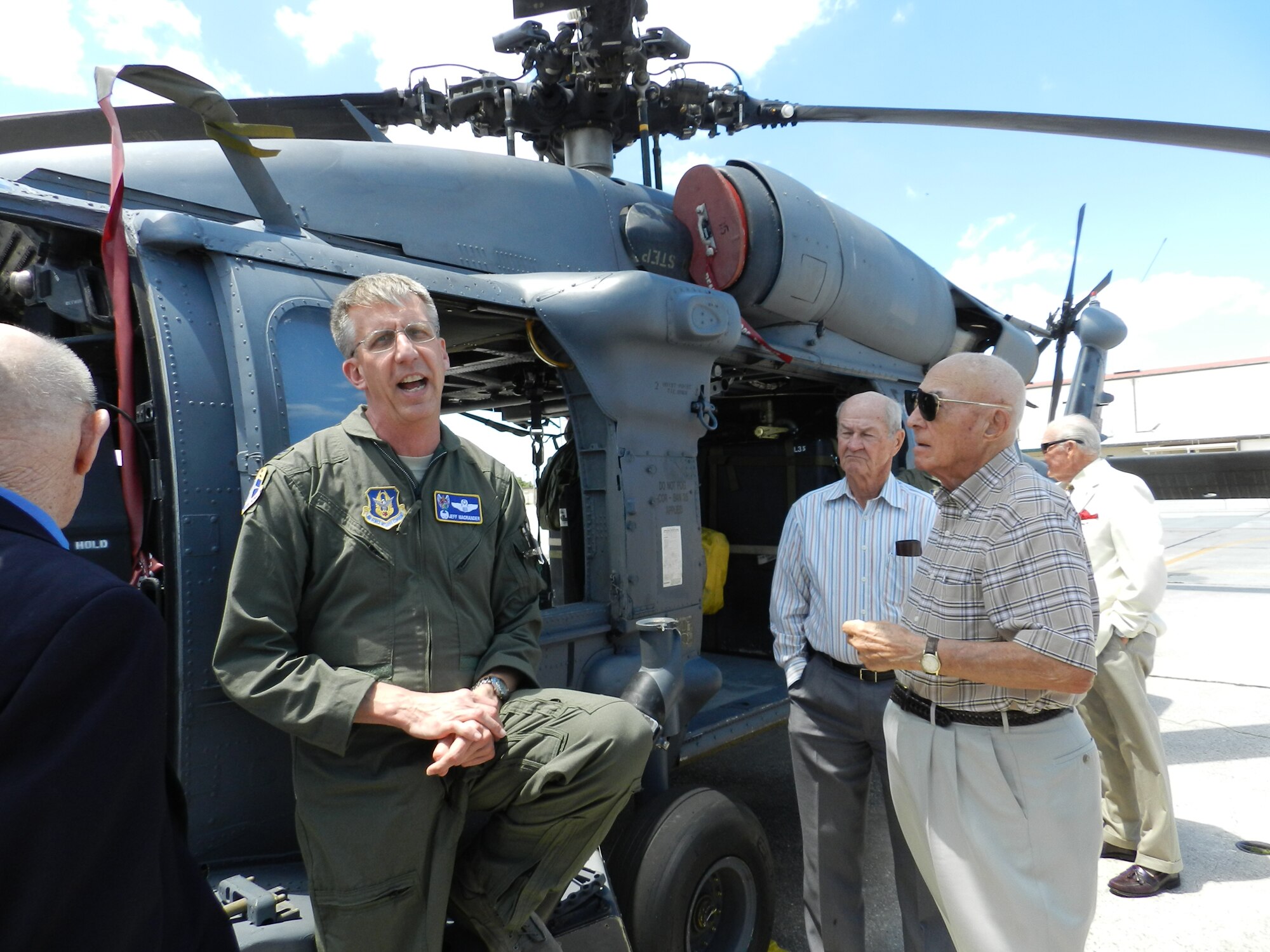 Col. Jeffrey Macrander, 920th Rescue Wing commander, shared stories about piloting the HH-60G Pave Hawk helicopter with 23 General Officers who toured the 920th RQW May 7 during their annual visit to Patrick Air Force Base, Fla. The retired generals visit the base annually for Wing updates. The Pave Hawk was one of nine that is used for combat-search-and-rescue missions flown by the 920th RQW.  (U.S. Air Force photo/Maj. Cathleen Snow)