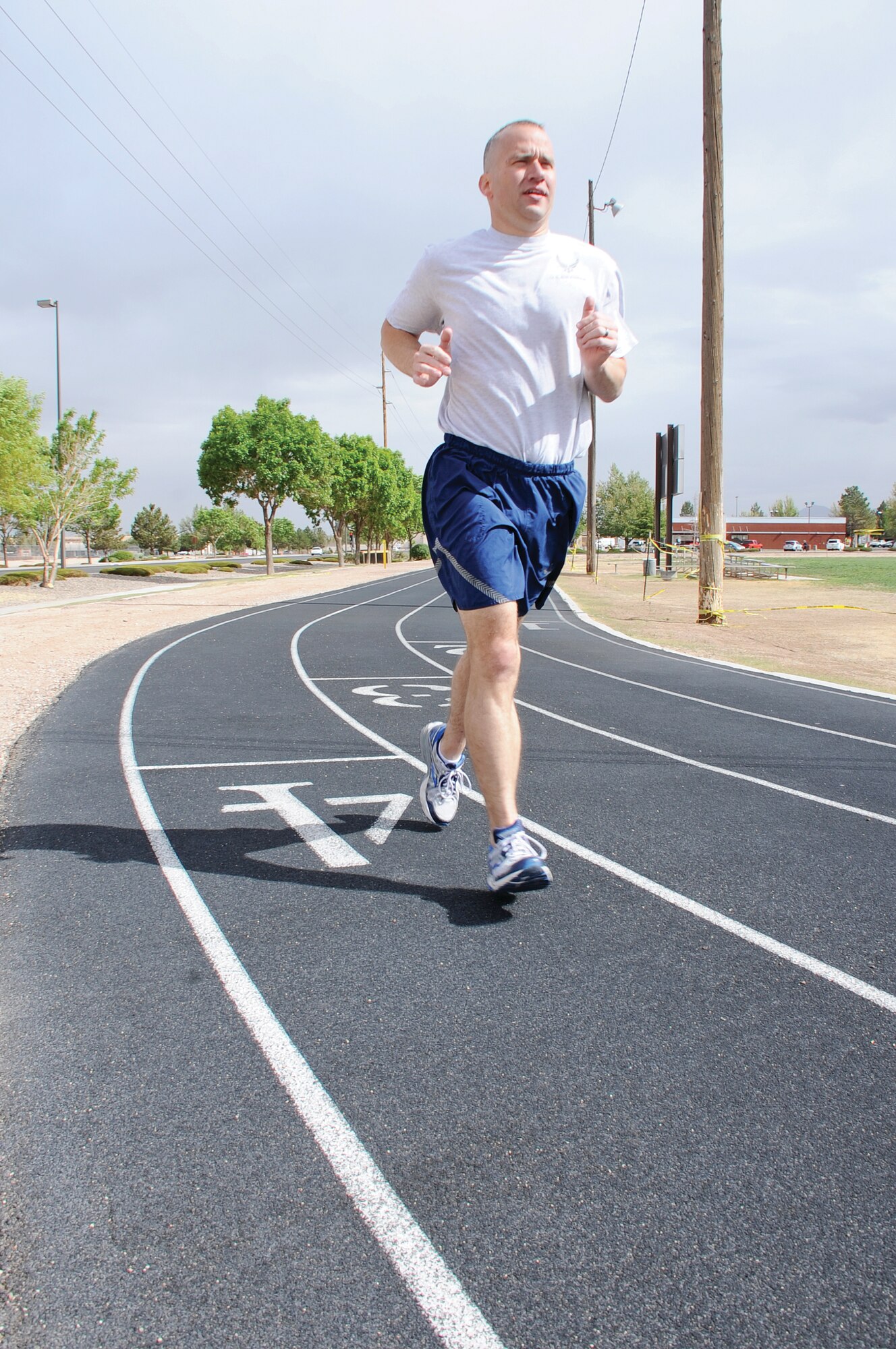 Tech. Sgt. Scott Borlinghaus, executive for the 377th Security Forces Group, trains for the Air Force marathon. He is racing to raise money for the Air Force Enlisted Village. (Photo by Todd Berenger)