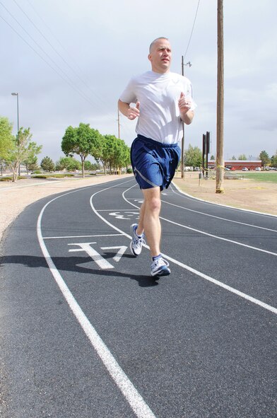 Tech. Sgt. Scott Borlinghaus, executive for the 377th Security Forces Group, trains for the Air Force marathon. He is racing to raise money for the Air Force Enlisted Village. (Photo by Todd Berenger)