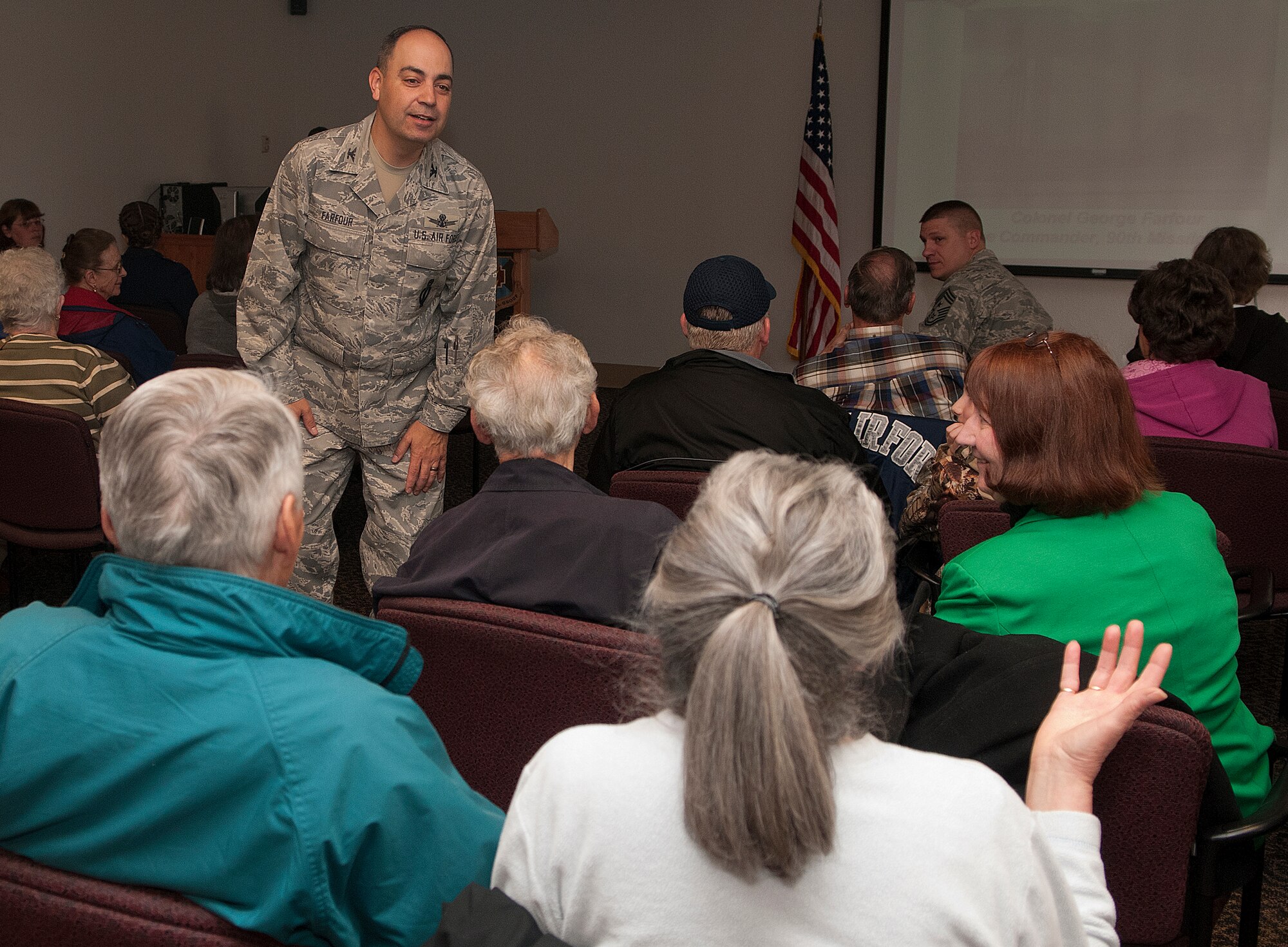 Col. George Farfour, 90th Missile Wing vice commander, listens to a question during F. E. Warren Air Force Base’s Retiree Appreciation Day held in the base clinic May 4. Retirees were able to attend briefings on subjects such as survivor benefits and access to the pharmacy as well as visit with service providers and venders. (U.S. Air Force photos by R.J. Oriez)