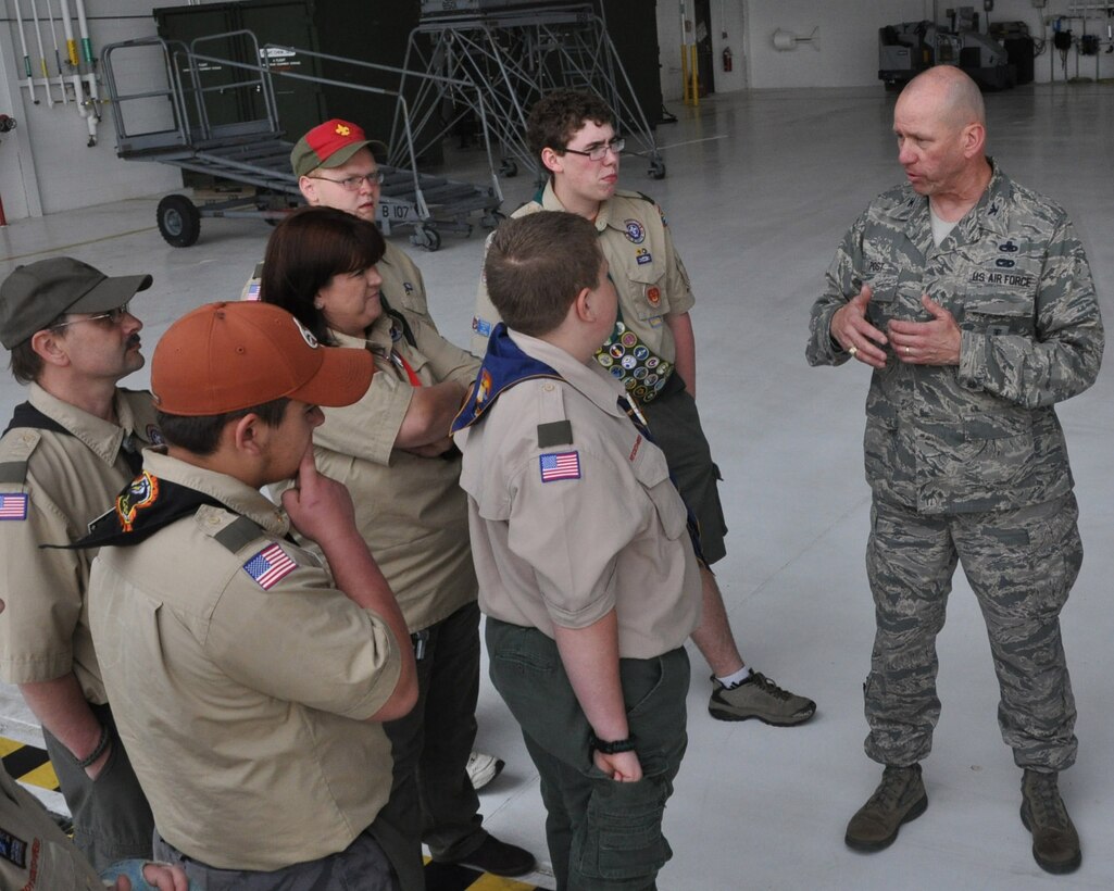 Air Force Reserve Col. David Post, commander of the 910th Maintenance Group, talks to local Boy Scouts during a tour of a C-130H Hercules May 8, 2013 here. 