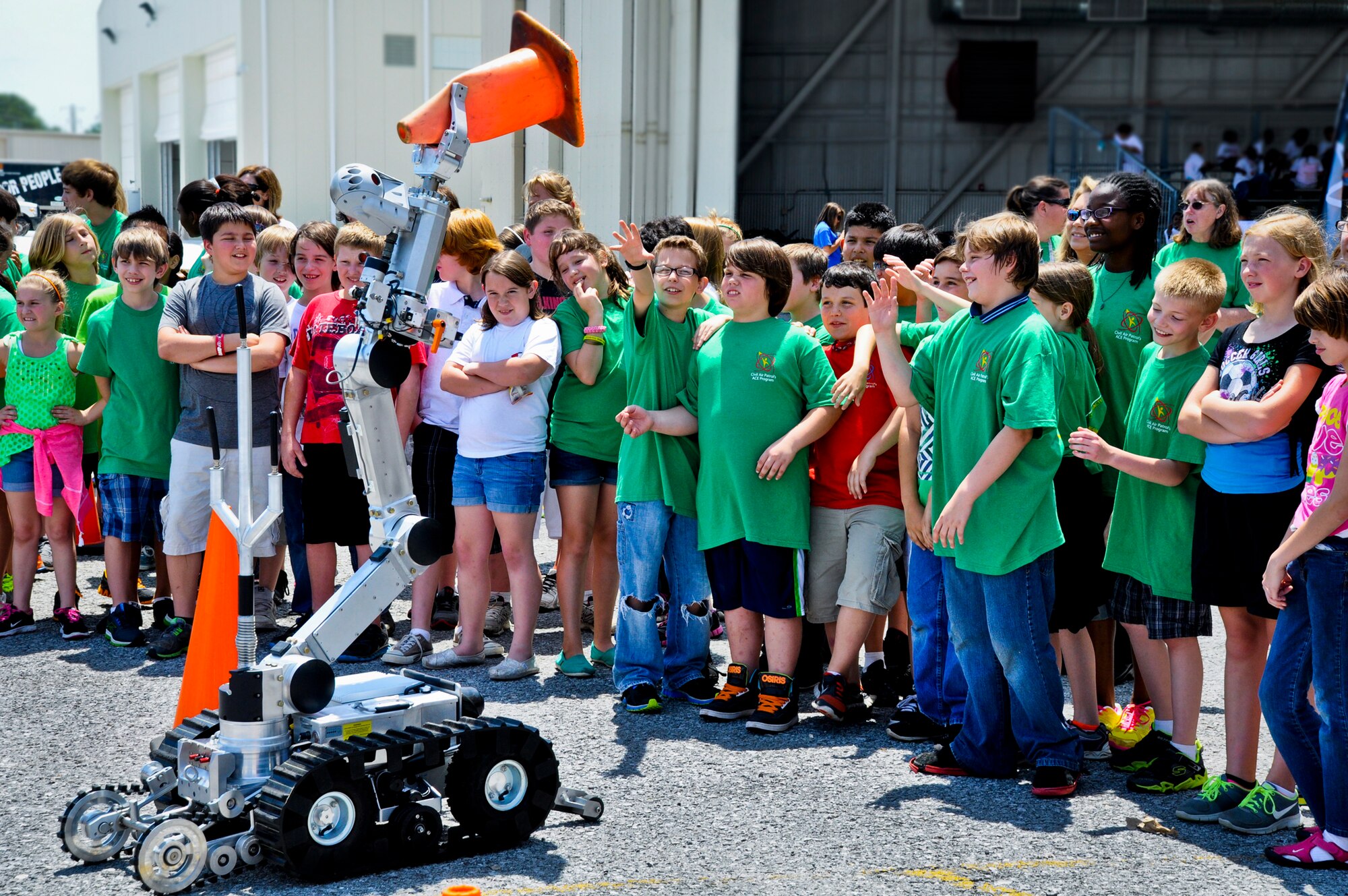 After the completion of their Mars habitats, technicians from the 96th Explosive Ordnance Disposal Flight demonstrated the use of robots in locating and disposing of bombs. The students were able to see first-hand how the robots maneuver and talk to the technicians who operate them.  (U.S. Air Force photo/Sara Vidoni)