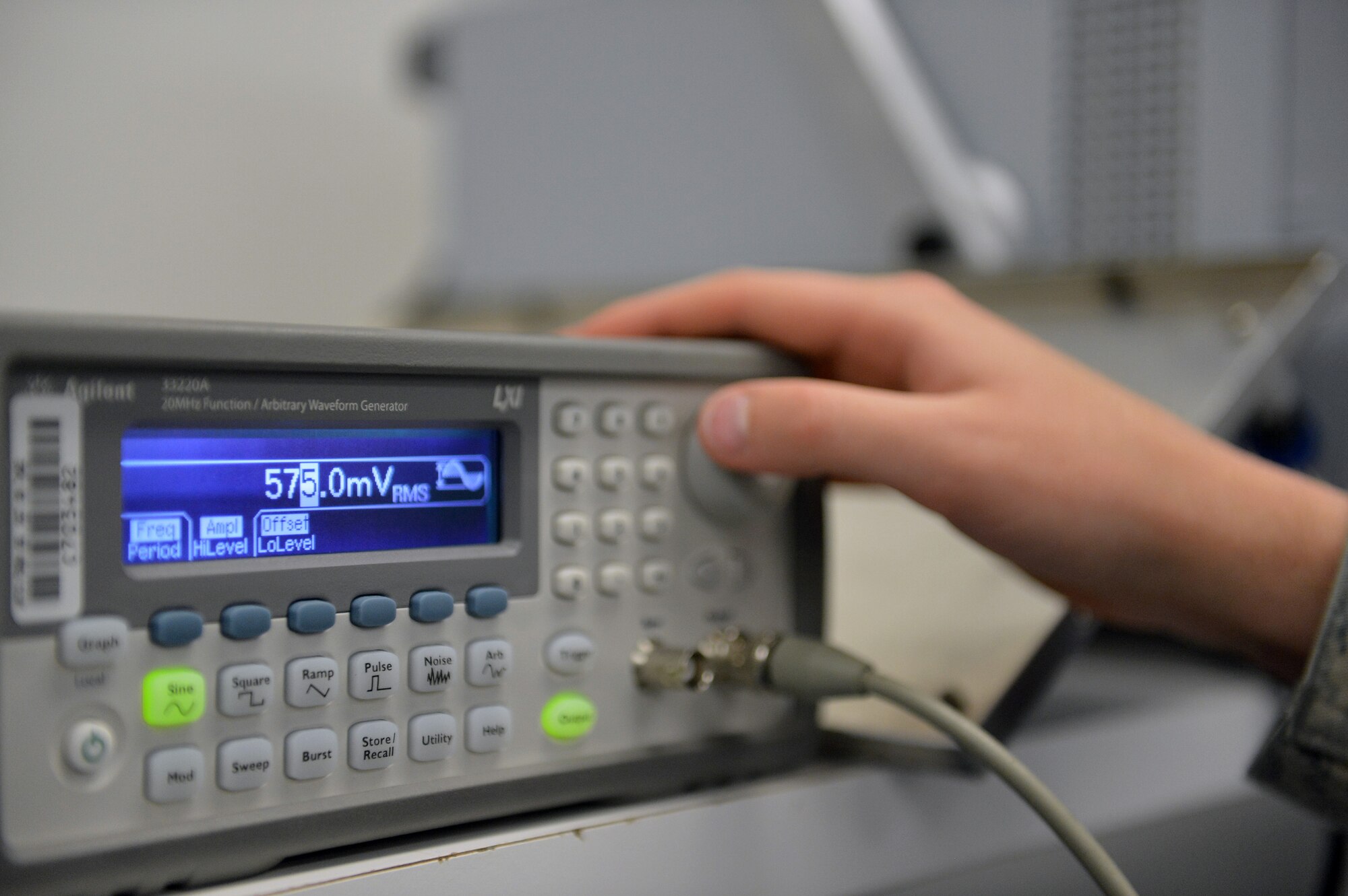 Senior Airman Shawn Meyer, 62nd Maintenance Squadron Test Measurement Diagnostic Equipment Flight metrology technician, adjusts the voltage output on a waveform generator in order to calibrate a countermeasure tester May 2, 2013 at Joint Base Lewis-McChord, Wash. The TMDE flight is responsible for the calibration and repair of more than 7,000 test equipment items for more than 180 customers across the Pacific Northwest. (U.S. Air Force photo/Airman 1st Class Jacob Jimenez)